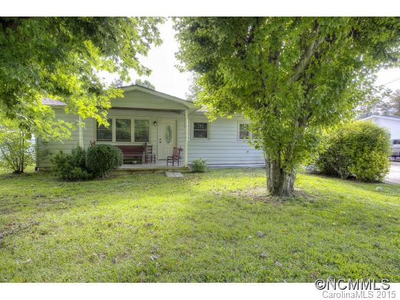 Completely, tastefully updated, one level, low maintenance home on a level lot with great backyard and paved, state rd, year round access super convenient to Hazelwood and Waynesville. Full remodel includes cabinetry, appliances, flooring, windows, paint, lighting and plumbing fixtures, doors and more.  LIKE NEW condition with design and finishes you would expect in a higher priced home.  A great opportunity for first home, downsizing, investor.