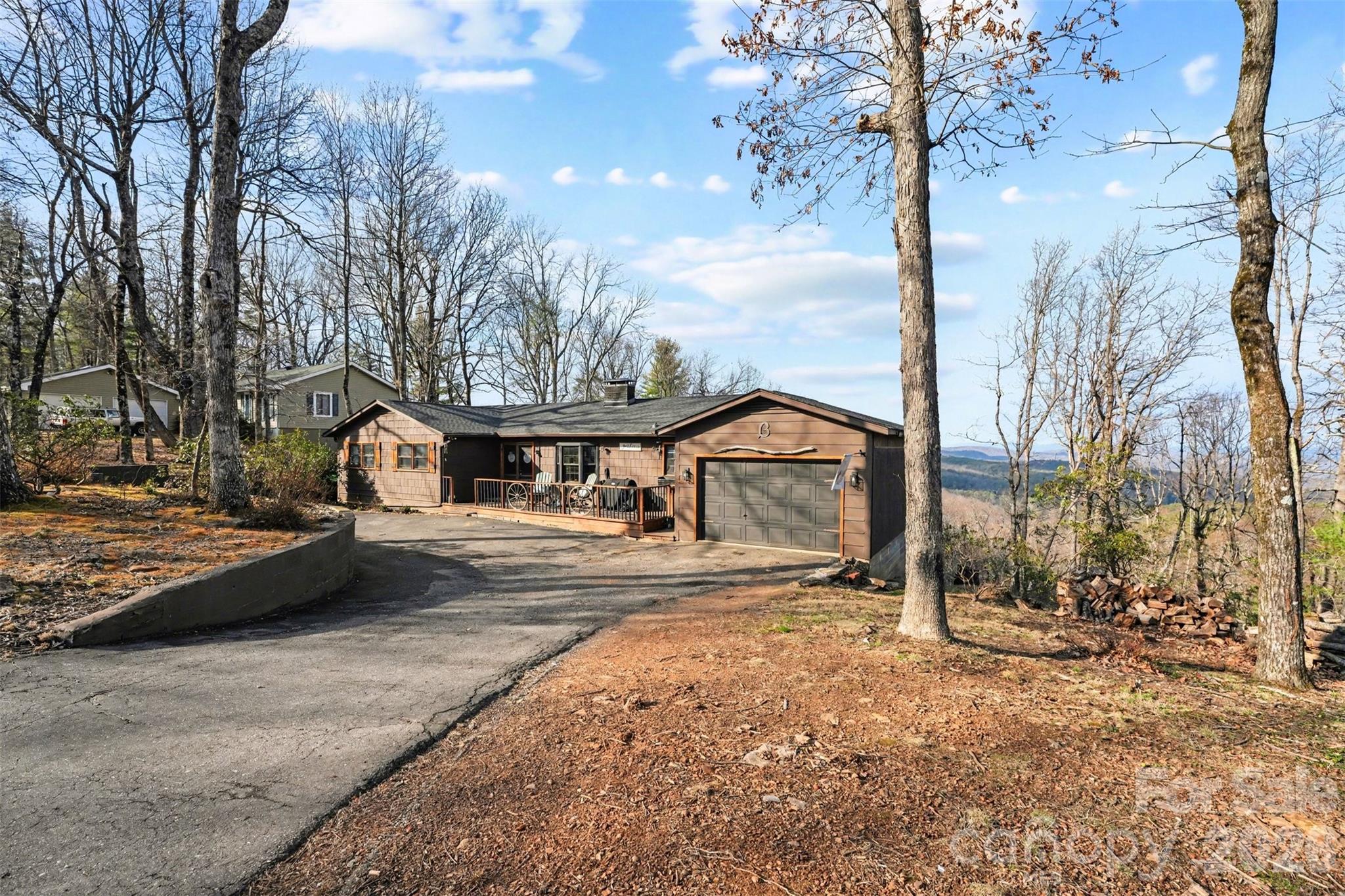 Motivated sellers! Price reduced to account for repainting the home! Live next door to South Mountains State Park where your backyard is 40+ miles of trails and waterfalls. Located in Pine Mountain, you're approximately 50 minutes from Charlotte, 25 minutes from Hickory, under 45 minutes to Lake Norman, and about an hour to Asheville. Quick access to I-40 makes commuting or weekend trips simple. USDA loan eligible, offering a zero down financing opportunity for qualified buyers. The home is set on over an acre with a roof from 2025 and HVAC from 2019. The main level features three bedrooms and two bathrooms, an open layout designed to draw your eyes straight to the scenery, and a wood-burning fireplace that makes cool evenings feel extra inviting. The expanded kitchen offers plenty of space for gathering and entertaining.Downstairs, the basement includes a private fourth bedroom and two full bathrooms, along with patio access and a dedicated workshop. Mountain privacy. Outdoor adventure next door. Easy access to the city when you need it.
Come see it in person because the view is even better when you're standing in it.
Please do not walk the property without an appointment or an agent.