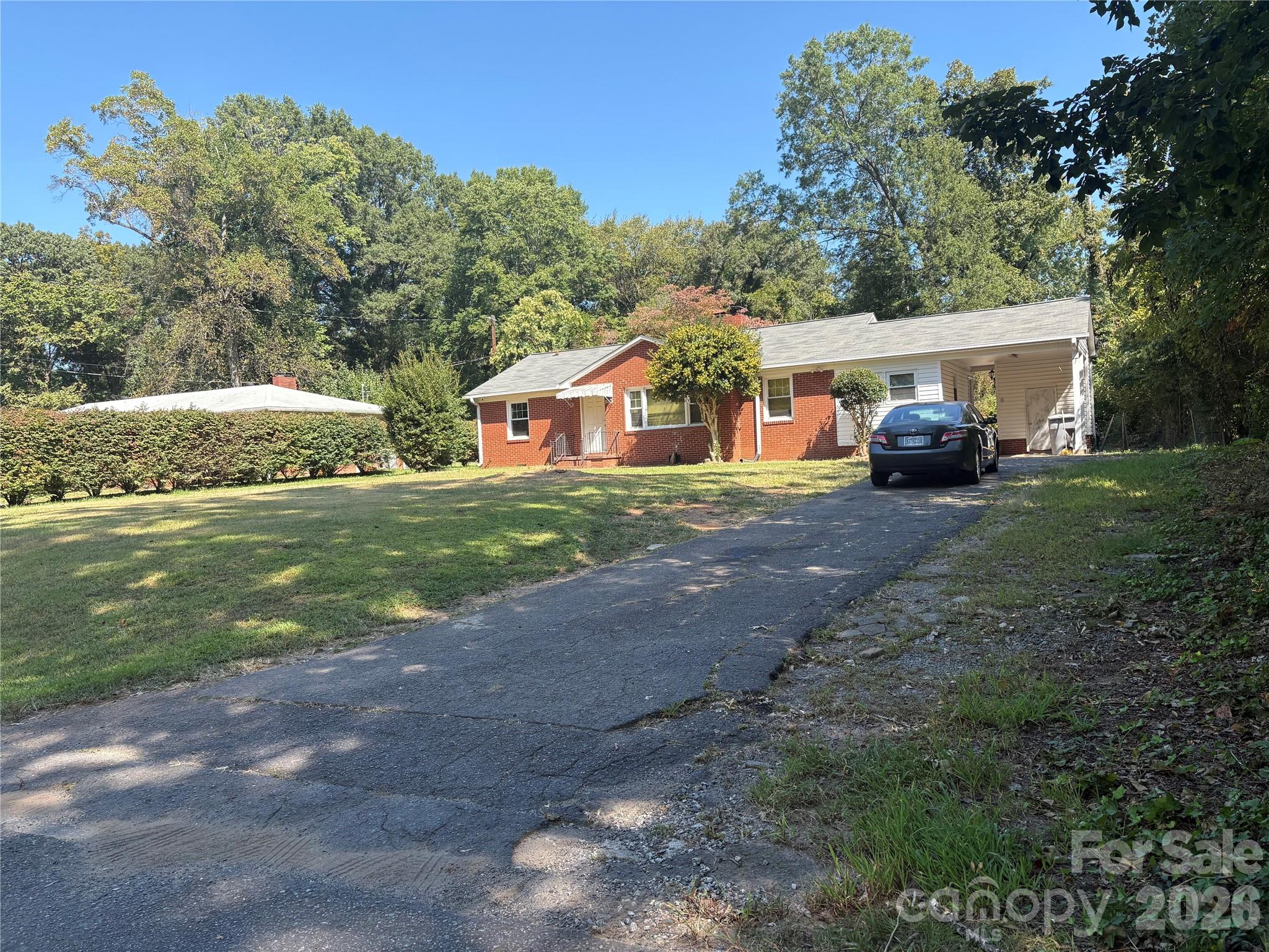 Welcome to this well-maintained 3-bedroom, 1.5-bath full-brick home located at 5206 Burke Dr in Charlotte. This property is currently tenant-occupied, generating $1,500/month in rental income—making it a great opportunity for investors seeking immediate cash flow.The home features original hardwood floors throughout and an open-concept layout that creates a bright and inviting living space. Solid brick construction offers long-term durability and low maintenance, ideal for a buy-and-hold investment strategy. Situated in a quiet neighborhood just minutes from Uptown Charlotte, this property benefits from strong rental demand and convenient access to major highways, shopping, and dining. Whether you’re looking to expand your rental portfolio or secure a turnkey income-producing property, this is an excellent opportunity you don’t want to miss.