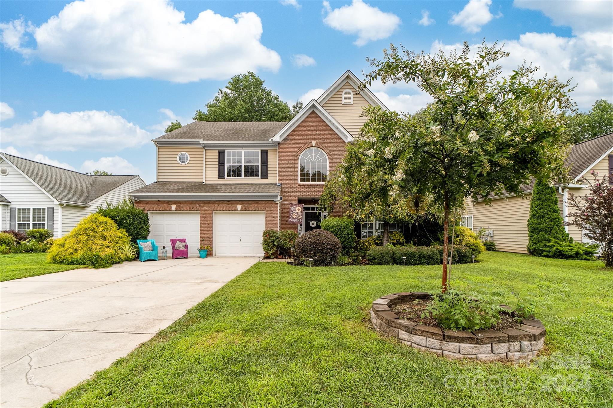 Lovely Legacy Park home just hit the market in Indian Land!! This beautiful home features four bedrooms, 2½ bathrooms, and 2622 sq ft of living space. The first floor features a sitting room currently used as an office, dining room, den with gas log fireplace, and an open kitchen. The kitchen has stainless steel appliances, Corian countertops, a built-in microwave, and a pantry. This spacious home also boasts a large bonus room upstairs with an additional fireplace. During the summer, entertain on the screened-in porch or relax in the private fenced backyard. This home also has a large two-car garage with an additional area for an extra refrigerator or freezer and tons of storage space. It is in an active community with many activities, including a community pool, playground, and walking trails.  The sellers will offer the buyer credit towards the 2-1 buy-down from Leslie Beaver at Movement Mortgage with an acceptable offer.
