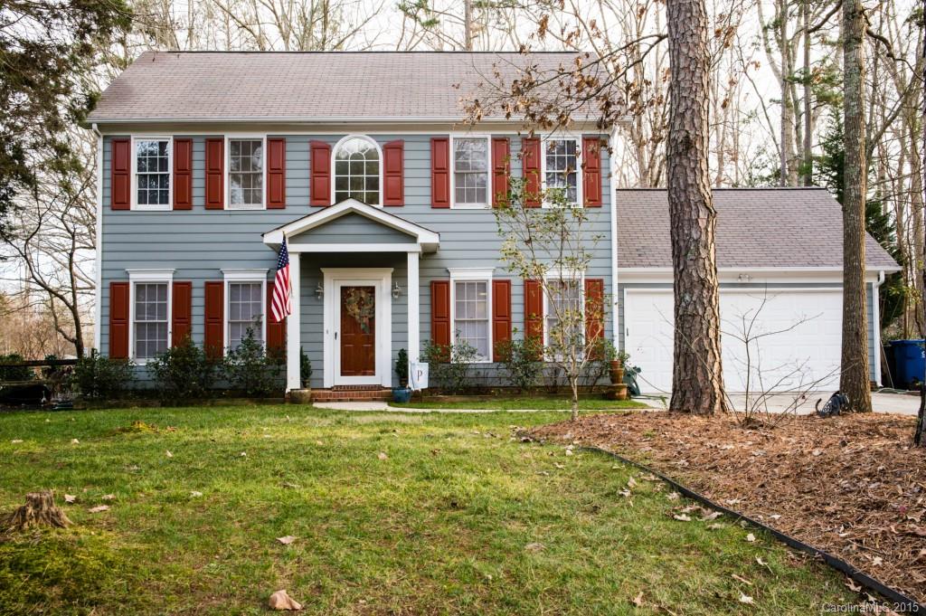Beautiful Updated home. Brand New Carpet Throughout (Dec 2014) Kitchen Granite Counter Tops and Appliances all redone within last year. Amazing Brand New Wood Floors throughout the main floor. This 3 Bedroom 2.5 Bath is a great home listed at a great price. Large Fenced yard on a Corner Lot. Owners painted the entire interior in Dec 2014 this home is Move In Ready! You must see this home to appreciate all the Charm that it has.