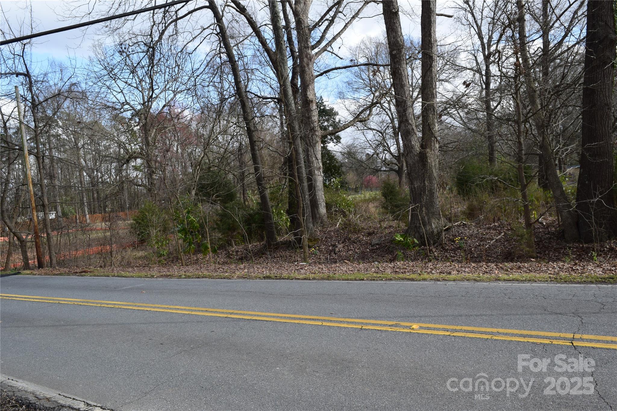 Great opportunity to build your dream home on this half-acre lot located at the corner of Twin Lakes and Enola Dr.