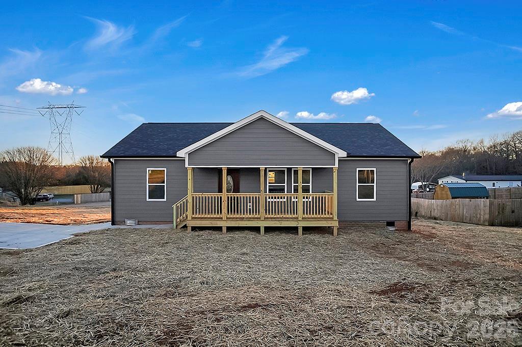 Welcome to this beautifully crafted new construction home featuring 3 bedrooms and 2 full baths, perfectly situated on a spacious ½-acre corner lot. Offering 1,331 sq ft of thoughtfully designed living space, this home blends modern style with everyday comfort.

The open layout highlights a stylish kitchen with stainless steel appliances, a center island ideal for entertaining or casual dining, and contemporary finishes throughout.

Enjoy the peace of mind that comes with a 2-10 Home Warranty, along with the convenience of quick access to the new Hwy 74 bypass—making commuting, shopping, and daily travel easy.

Move-in ready and offering space, style, and location, this home is a fantastic opportunity you won’t want to miss.