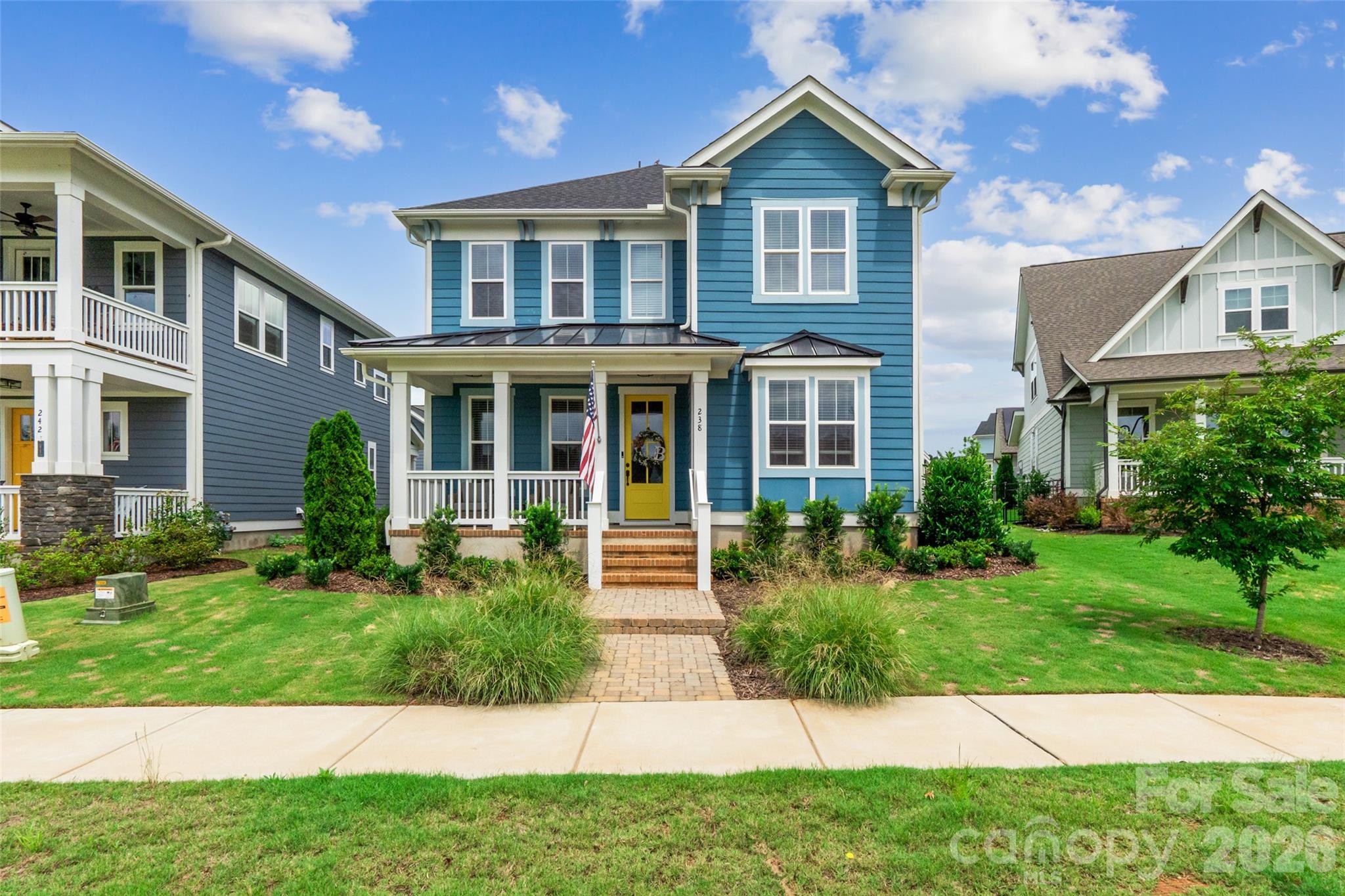 Welcome to this stunning 4-bedroom, 3-bathroom home in the highly sought-after Riverwalk community! Ideally located within walking distance to local shops, restaurants, and the scenic Riverwalk Trail along the Catawba River, you'll enjoy easy access to kayaking, tubing, walking, and outdoor recreation right outside your door.

Inside, you'll find a bright and open floor plan filled with abundant natural light and designer finishes throughout. Recent upgrades include new light fixtures throughout the home and an added fireplace insert upstairs, enhancing both comfort and style. The dedicated office with rich accent walls provides the perfect work-from-home space, while the spacious living room offers a cozy fireplace and seamless flow into the dining area and gourmet kitchen. The kitchen is a true centerpiece with a large island, stainless steel appliances, stylish cabinetry, and plenty of space for entertaining.

The generous primary suite features a spa-like bath with a large tiled shower, dual vanities, and an oversized walk-in closet. Additional bedrooms provide flexibility for guests, family, or hobbies.

The garage has been fully finished and insulated, adding extra functionality and comfort. Step outside to your private fenced backyard retreat, enhanced with added privacy fencing and an upgraded paver patio in place of concrete. Enjoy the extended outdoor living space complete with a covered entertaining area and hot tub—perfect for relaxing after a day on the river. The home also offers a park-like greenspace as the front yard, adding to its open and inviting feel.

This exceptional home combines modern upgrades, thoughtful improvements, and one of the best locations in Riverwalk. Don’t miss your opportunity to experience the lifestyle this community has to offer!