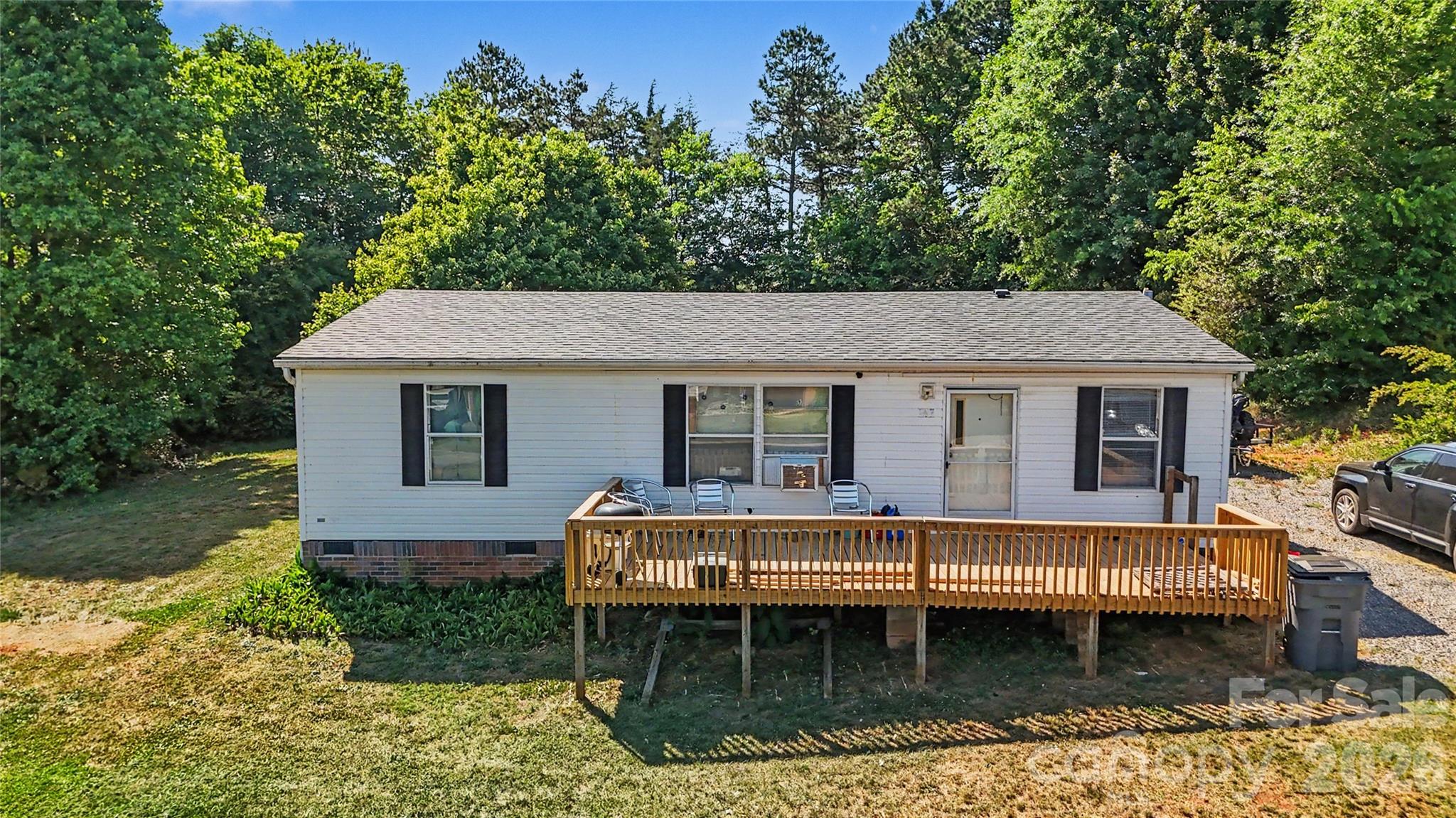 Discover this charming 2-bedroom, 2-bath home conveniently located near both Statesville and Troutman! This home offers a great blend of comfort, value, and recent upgrades, including a brand-new roof, new front deck, and a new well pump for added peace of mind.
Inside, you’ll find a functional layout with comfortable living spaces and plenty of potential to make it your own. Enjoy the quiet setting while still being just minutes from shopping, dining, and major highways.
All of these updates and conveniences for under $200K make this a fantastic opportunity for first-time buyers, downsizers, or investors alike. Don’t miss your chance to own an affordable home in a growing area!