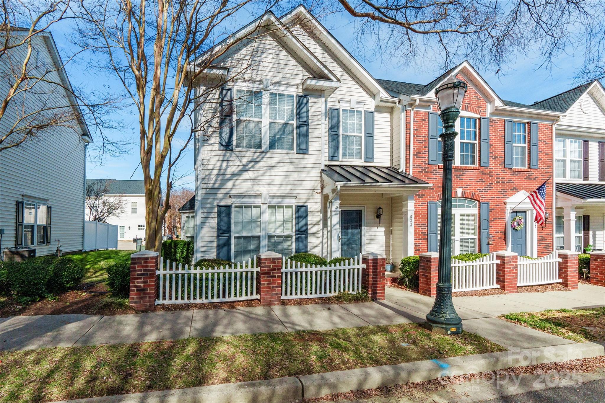 This inviting townhome, located in the highly sought-after Manchester Village community, offers a kitchen with granite countertops and a spacious center island, perfect for meal prep and entertaining. A convenient half bath on the main level adds to the home's functionality. The main floor also features newer flooring, enhancing the fresh feel throughout. Upstairs, you'll find two generously sized bedrooms, including the primary suite with a tray ceiling and a large walk-in closet. The primary bathroom has been updated with a brand-new stand-up shower, stylish new flooring, and includes a dual vanity. Enjoy access to the community pool and the excellent location, just minutes from shopping, dining, and more. This townhome is a must-see—don’t miss out!