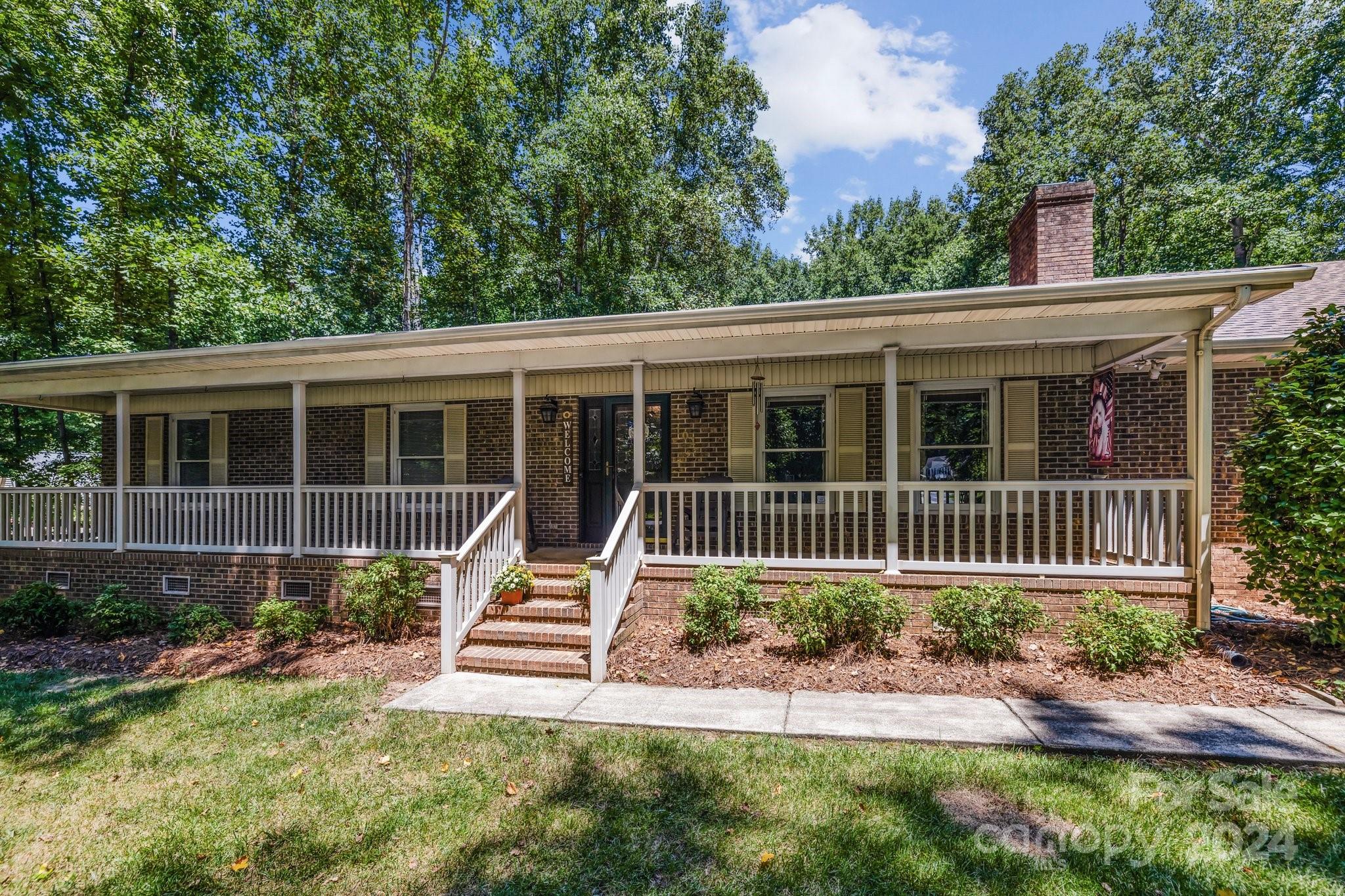 Experience tranquil living in this charming gem on 0.75 acres in Locust. This home offers spacious indoor and outdoor areas perfect for relaxation and entertainment. Enjoy cozy evenings by the gas log fireplace in the living room, or unwind on the front porch or back deck with serene nature views. Storage is plentiful with ample closet space, a walk-in pantry/laundry combo, and abundant cabinets and counters in the eat-in kitchen. Conveniently located near shopping, dining, and highways 24/27, this home combines peaceful living with no HOA. Don’t miss out!