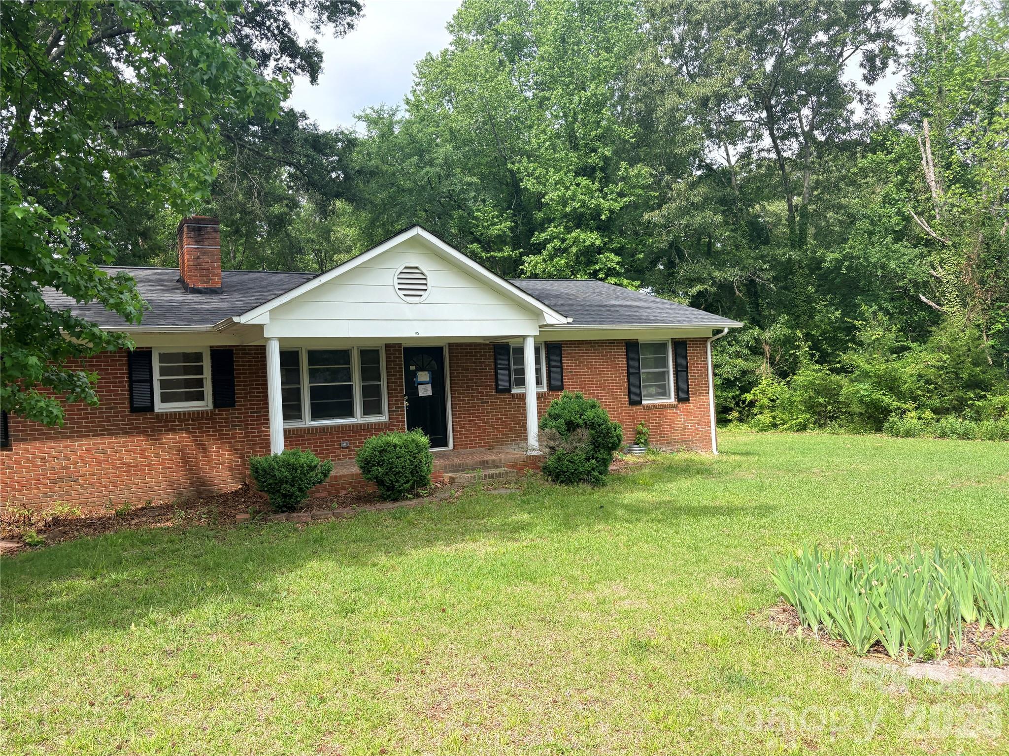 Spacious All Brick Ranch on 0.79 Acre Lot. Features include Granite Countertops with SS Appliances, LVP Flooring throughout, Fireplace in Living Room. 2 Full Bathrooms, Covered Front Porch and Rear Deck. Central HVAC. Two Car Carport. Property is being Sold As-Is.
