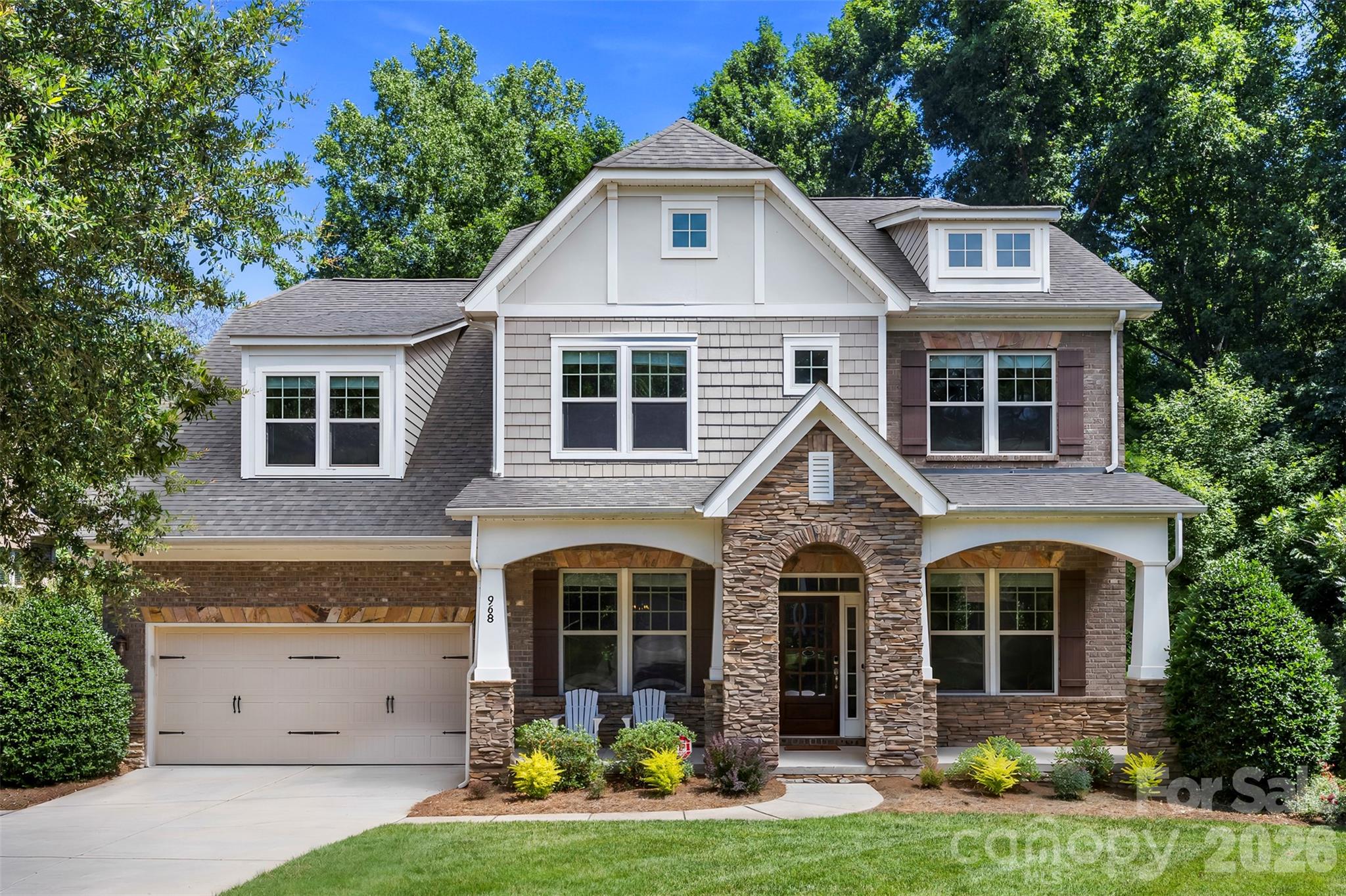 Stunning home in the highly sought-after Barber Rock community, offering an unbeatable location in the heart of Indian Land just minutes from Ballantyne and Fort Mill. Enjoy convenient access to top-rated schools, premier dining, shopping, and everyday amenities. What truly sets this home apart is the incredible indoor-outdoor living experience. The finished basement creates the perfect extension of the home featuring a private bedroom, full bath, spacious living area and a dedicated movie room complete with projector and screen ideal for entertaining. 

Step outside and you’ll find a backyard designed to impress. Enjoy a covered patio, low-maintenance, decking, and a built-in fire pit, all surrounded by mature trees that create a private, peaceful setting perfect for year-round gatherings or quiet evenings at home.

Inside, the main level offers an open and inviting floor plan with rich hardwood floors and thoughtful design throughout. The spacious living room with gas fireplace flows seamlessly into a well-appointed kitchen featuring a gas cooktop & oven, large island, pantry, and stainless steel appliances. A formal dining room, private office, and bright breakfast area complete the main level. 

Upstairs, the expansive primary suite features a spa-like en-suite bath with garden tub, walk-in shower, and generous walk-in closet. Three additional bedrooms and a bonus room provide flexible space for family, guests, or work-from-home needs.

Additional highlights include a 3-car garage, surround sound, and included security system equipment. Community amenities include a clubhouse, outdoor pool, playground, and walking trails.

This is the one buyers have been waiting for: space, privacy, and standout entertaining features all in one. Schedule your showing today.