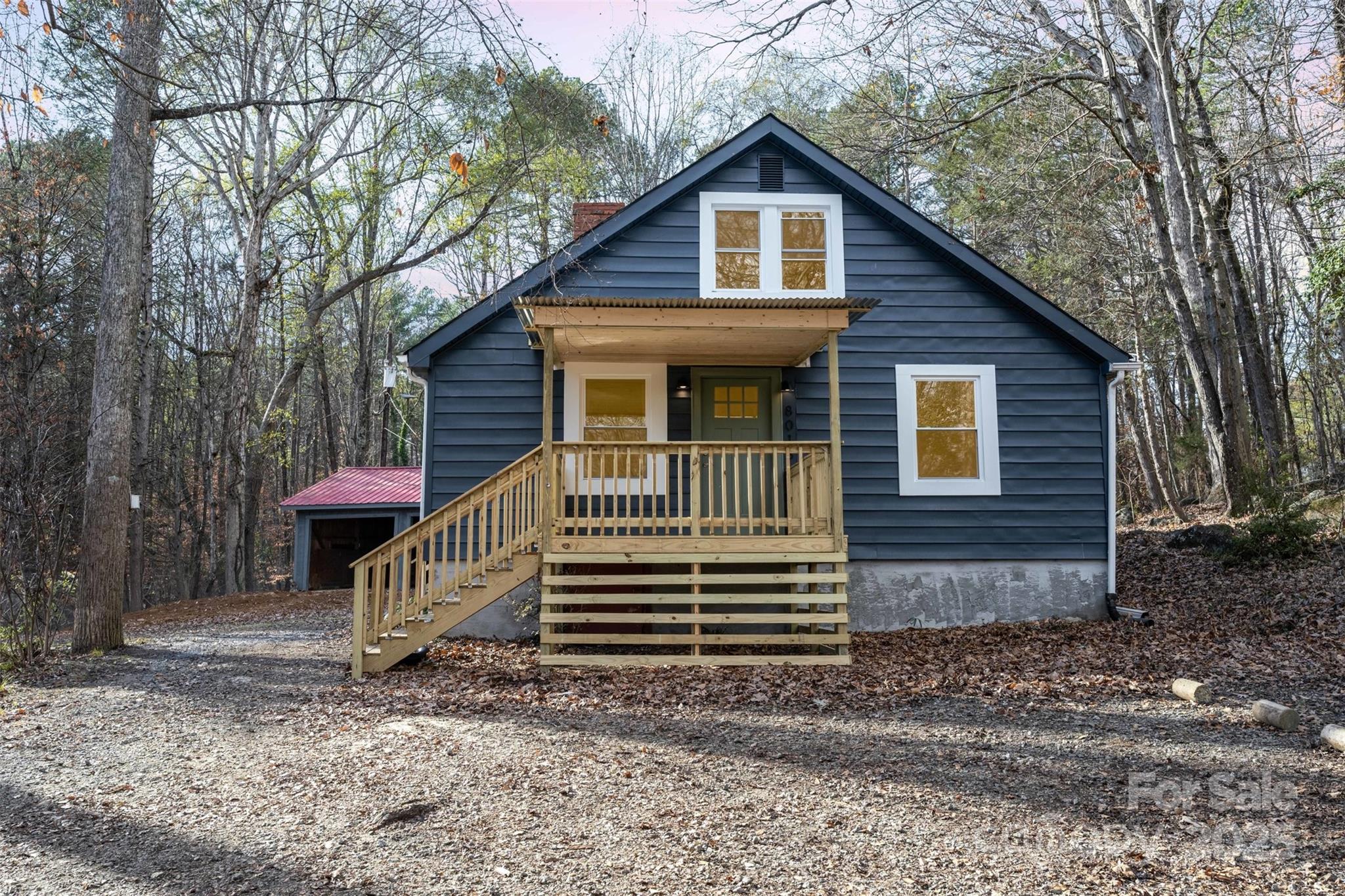 Welcome to this charming, freshly updated Cape Cod home on nearly two acres, just a short drive from beautiful Lake Norman. Enjoy its cozy appeal with the original wood-burning fireplace paired with modern updates throughout, including new windows and plank flooring. The kitchen offers an open layout with new cabinetry, butcher block countertops, a gorgeous tile backsplash, and a huge pantry. Spacious full bathrooms feature new fixtures and modern lighting, while the primary bedroom includes a generous walk-in closet. Upstairs, you’ll find a sunny bonus loft or flex space, perfect for a home office or additional gathering area. For lake lovers, a convenient boat ramp is located just one minute from the home. Country living meets the sought-after Cowans Ford area of Lake Norman—don’t miss this unique opportunity!