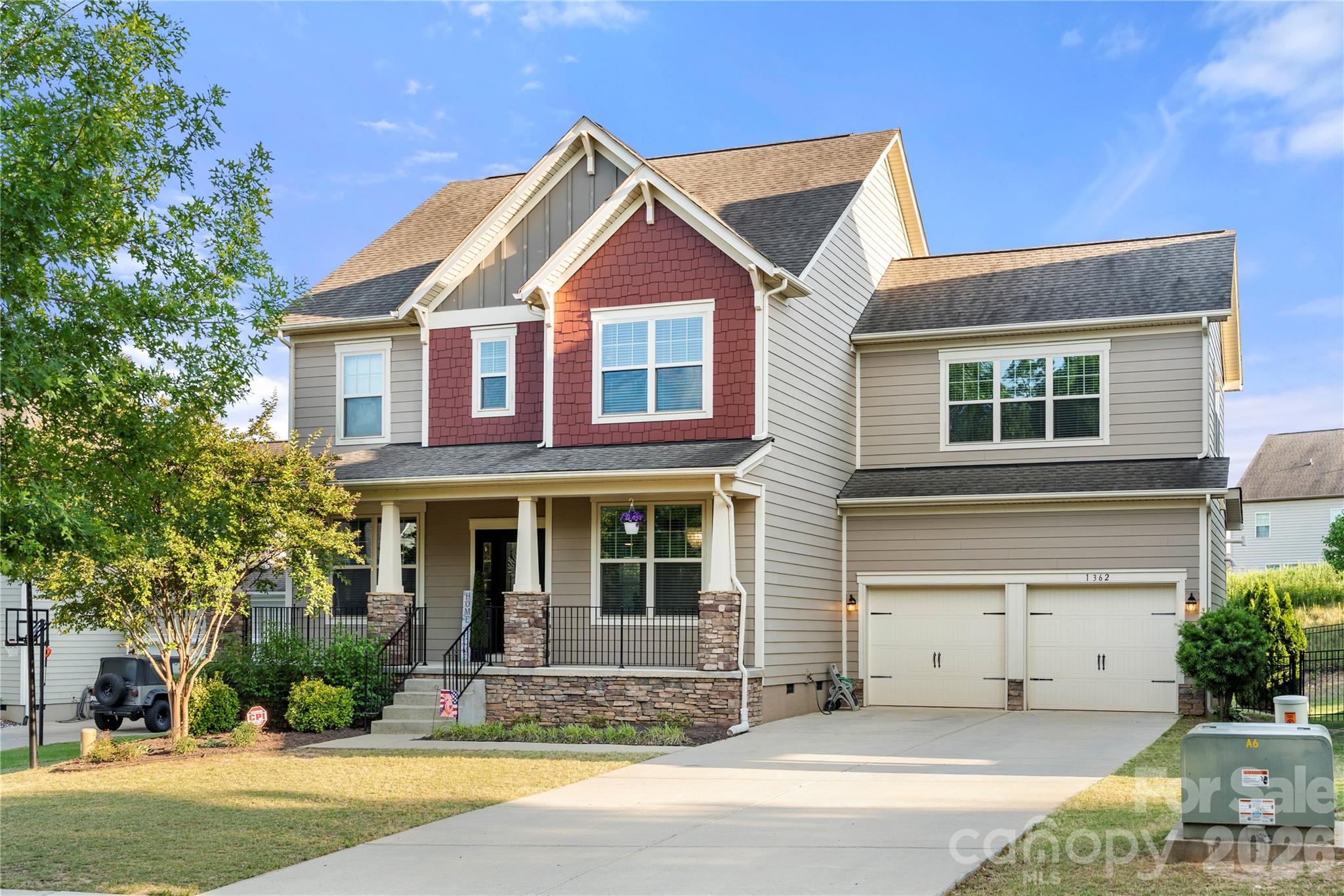 Come live in luxury at Waterside by the Catawba! One of Fort Mills most sought after neighborhoods. Situated at the end of a cul de sac street, and one of the premier lots in the neighborhood, this home boasts high end finishes and outdoor living space with good privacy. Many updates throughout the home include a California closet in the owner's ensuite, EV CHARGER in the garage and black iron fenced backyard. With its huge open floor plan and large kitchen island, family gatherings and friendly events are effortless. Pour out into the covered outdoor living space for extra space when needed or to enjoy the crisp morning breeze with a cup of coffee. The home office with French doors for extra privacy encourages the "work from home" model! Upstairs you'll find a large landing area and access to four bedrooms one bed/bonus room. All the rooms have great size and receive good natural light. The owner's suite includes a large bedroom space, dual vanity than wraps around, large soaking garden tub, free standing tiled shower, water closet and customized California closet. The bed/bonus room has a bathroom with a large shower and walk-in closet. The fenced backyard has a play set and is ideal for barbecues, gardening, pets and gatherings. There's has ample space for a pool and hot tub!