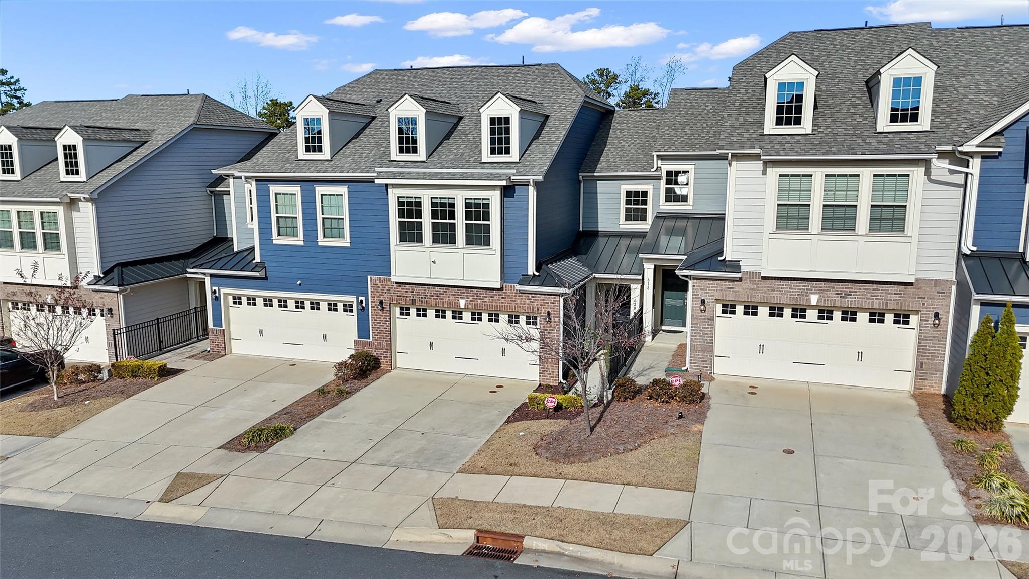 Discover this wonderfully two-story townhome, designed to feel bright and open with large windows that flood the space with natural light. The spacious kitchen is a true highlight, offering abundant cabinetry, extensive counter space, and a fantastic center island accented by stylish pendant lighting—perfect for meal prep, entertaining, or casual gatherings.

Upstairs, all bedrooms are conveniently located on the same level for ease and functionality. The owner’s suite features a luxurious bathroom complete with a deep garden tub, a large separate shower, and plenty of space to unwind at the end of the day. Additional bedrooms are well-sized and versatile, ideal for guests, family, or a home office.

Situated in the desirable Cameron Creek community, this home offers exceptional convenience with nearby shopping, dining, parks, and everyday essentials. Commuters will love the quick 5-minute access to I-77, making travel to Charlotte seamless and efficient while still enjoying the comfort and charm of a thoughtfully planned neighborhood.
