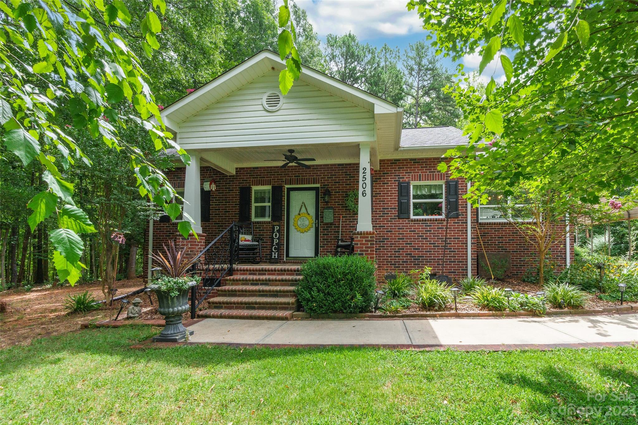 Charming and quaint 2 bedroom 1.5 bathroom ranch in Lancaster has everything you need! Massive front and back yards on a 3.18 acre lot, a detached carport, and a versatile outdoor living space in the back with a patio and huge concrete pad. On a wooded lot that provides plenty of shade, this house is also an energy efficient home with low monthly power bills! Open and airy rooms with vaulted ceilings, ceiling fans, recessed lighting, and a dining area create an open concept with spacious bedrooms. Great opportunity for a personal home or investment property!