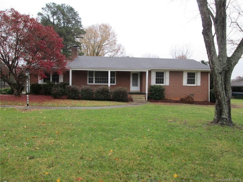Wonderful Full Brick Ranch home looking for new owners. This home is located on a corner lot, with a nice flat yard. The home has 2 wood burning fireplaces in the Den and Family room. The home has 3 bedrooms and 2 bathrooms. The 2 car carport also has a small storage room attached. The family room has a built in bar area for entertaining all of your friends and family.