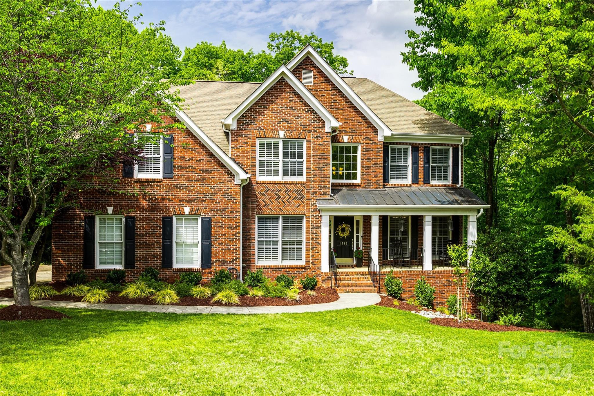 Prepare to be WOW'd upon entering this impeccably kept ever popular Buckingham model built by Turnberry! Incredible 2-story, full brick home w/basement sits on close to an 1/2 an acre tucked away on a quiet cul-de-sac! You are greeted by beautiful hardwoods, a home office, formal dining room & a sweeping 2-story great room anchored by a cozy fireplace. Updated kitchen w/ new 42" cabinetry, apron sink, lighted pantry & quartz counters. Up, find 3 add'l bdrms, all with ensuite bath access, a flex space & bonus room w/custom mahogany shelving. Owners suite on main w/a custom closet & spa bath w/ tile shower. The basement offers so much versatility! Entertain, play, work, whatever you desire, this space can accommodate it! Guest bedroom w/full bath & storage galore complete this level. Entertain in the private backyard on either the 2nd story deck or below on the covered patio w/ a hook up for an outdoor tv or just sit and reminisce around the fire pit. Long driveway w/ a side-load garage.