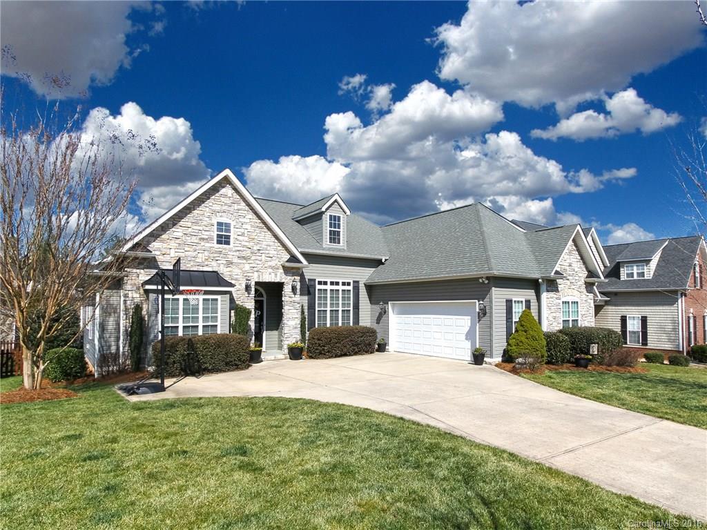 This beautiful home has been meticulously cared for and shows like a model! Ample space for a growing family. Relax in the two story Great Room, light a fire by remote & enjoy a movie in this "wired for surround sound" room. Kitchen has 42"l cabinets & beautiful granite counter tops for plenty of space and touches of elegance. First floor Master Retreat boasts double trey ceiling and crowns. Walk to community clubhouse & pool. Dave Lyle Blvd, I-77, shopping, entertainment & restaurants close by.