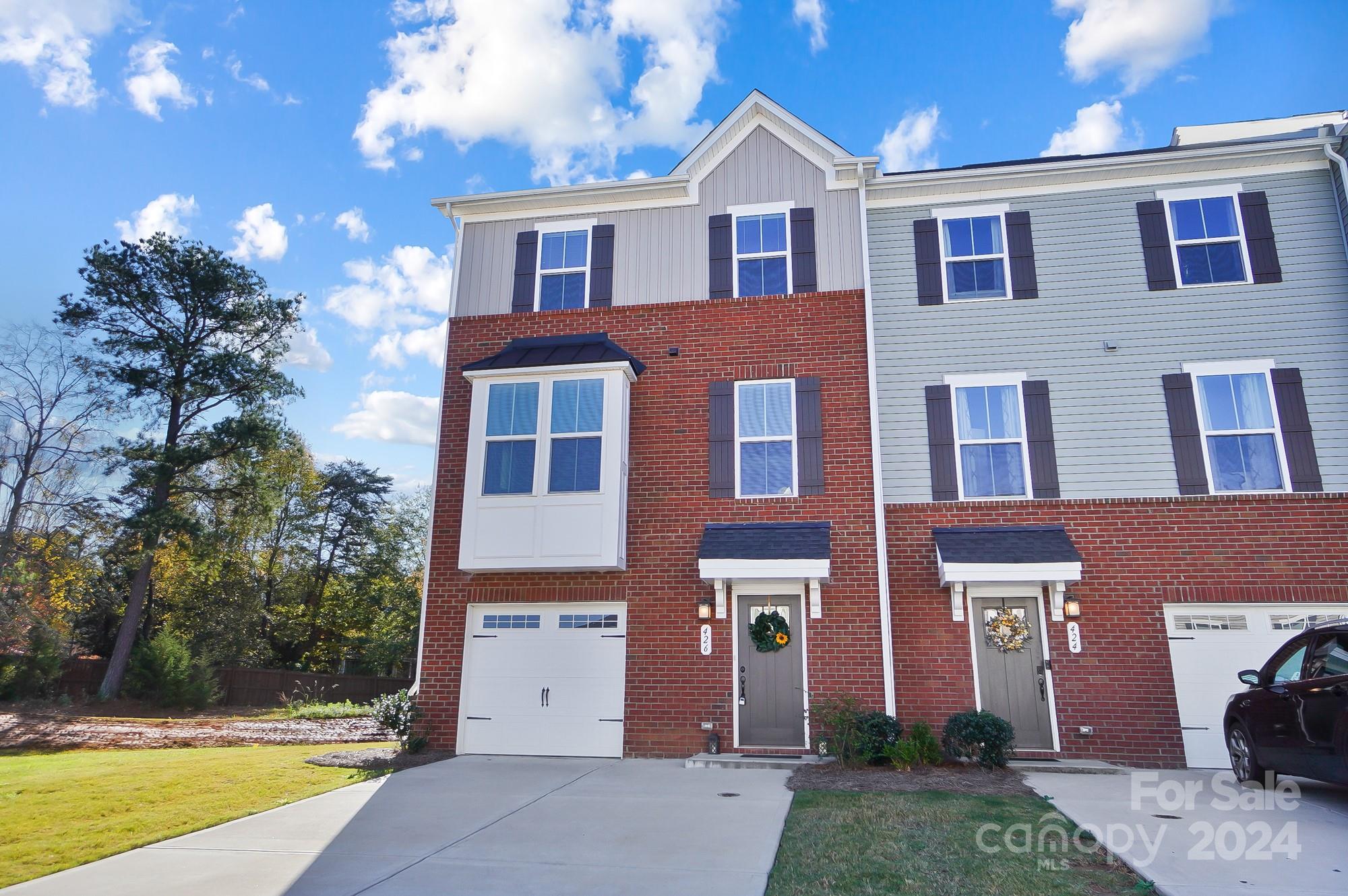 Seller is offering $3,000 credit to buyer with acceptable offer. This END-UNIT, 3-story townhome is located on a quiet cul-de-sac and offers a perfect blend of comfort & convenience. With 3 bedrooms, 2.5 baths, and a 1-car garage, this home is ideal for modern living. The main level features a versatile recreation room w/ sliding glass doors that open to a patio, offering easy outdoor access. On the second floor, the open floor plan integrates the living, dining & kitchen areas. The kitchen boasts a large granite island, SS appliances & pantry. Sliding doors lead to a deck that overlooks the private backyard. The third floor includes the primary bedroom w/ a large walk-in closet & en-suite bathroom w/ double sinks. Two additional bedrooms, a full bathroom & laundry room complete the upper level. Grantham Place is part of the Regent Park community, offering a pool, walking trails, sidewalks & playground for residents to enjoy.