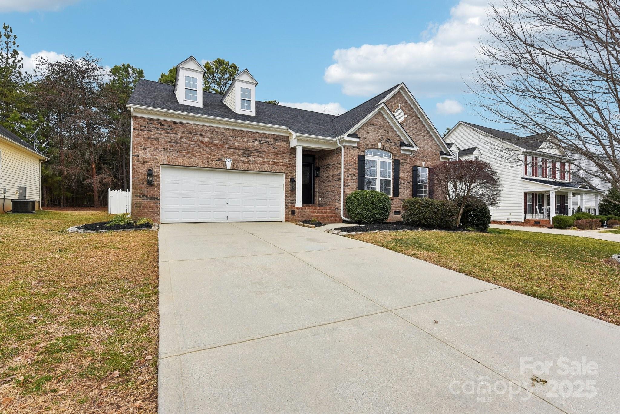 Welcome home to this beautifully renovated 4-bedroom, 3-bath ranch with a spacious bonus room upstairs in Fort Mill! Thoughtfully designed with warmth and elegance, this open-concept home is perfect for entertaining. The stunning kitchen features quartz countertops, a large island, and upgraded appliances, flowing seamlessly into both a formal dining room and a cozy breakfast area with pool views. Hardwood floors add timeless charm throughout the main living areas and primary suite. Primary features luxurious tiled bath ia spa-like tiled shower with a backlit mirror, double sinks with quartz countertops. Upstairs, a HUGE bonus room with a full bath is perfect for a teen retreat, while a downstairs office could easily serve as a 5th bedroom. Step outside to your private backyard oasis, complete with a sparkling pool—ideal for relaxing or hosting gatherings. Located in the highly desireable Fort Mill area this home offers a close proximity to dining, shopping and interstate access.