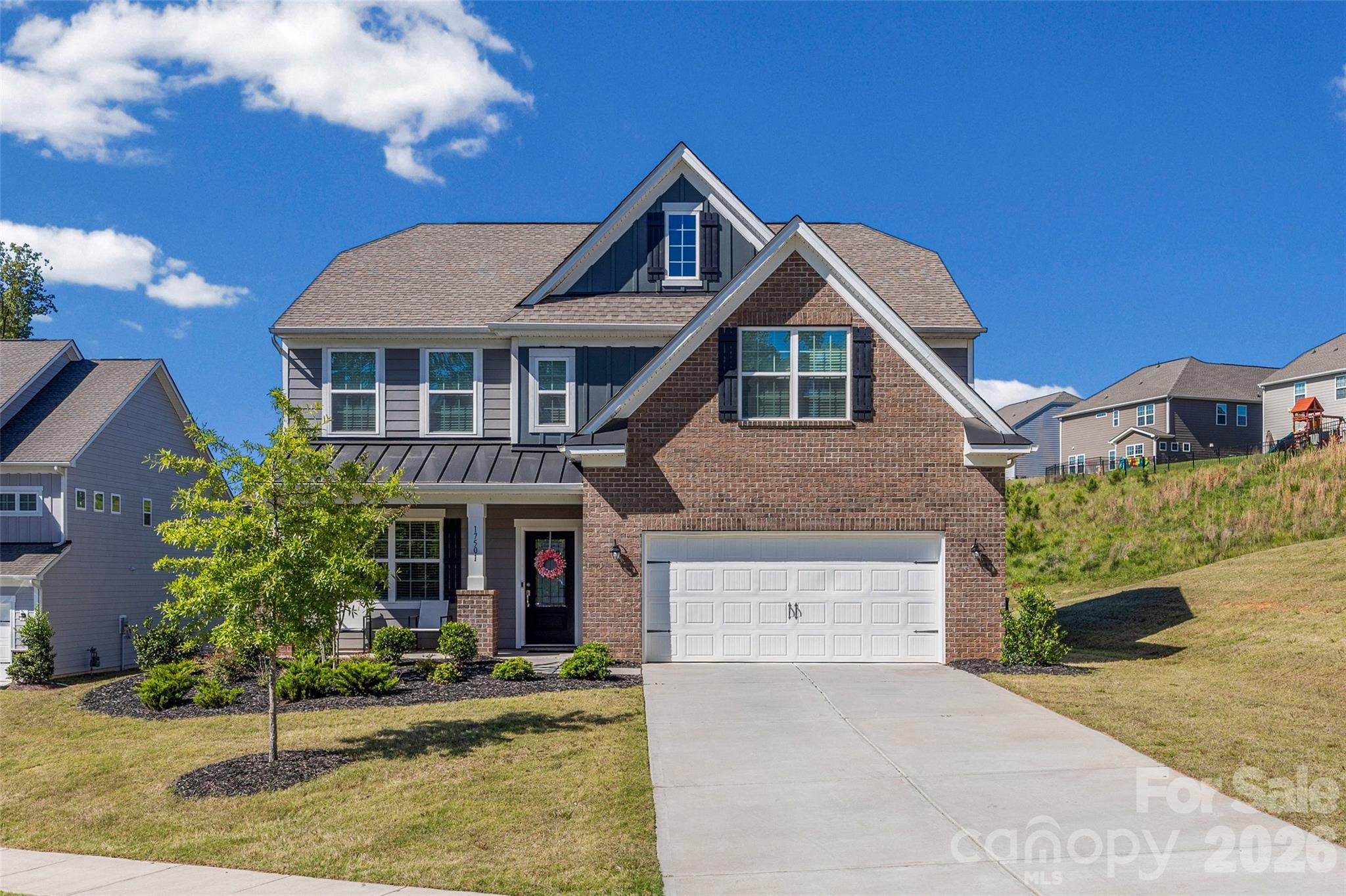 Welcome to The Palisades, a sought-after Charlotte community near Lake Wylie, Fort Mill, and Uptown, offering resort-style amenities including a pool, clubhouse, fitness center, and trails. The spacious 4BR/2.5BA home features an open layout with a fireplace, modern kitchen with breakfast bar, and a main-level office or flex space. Upstairs includes a large primary suite with dual vanities, plus a loft, three additional bedrooms, two full baths, and a laundry room. A perfect blend of space, comfort, and location.