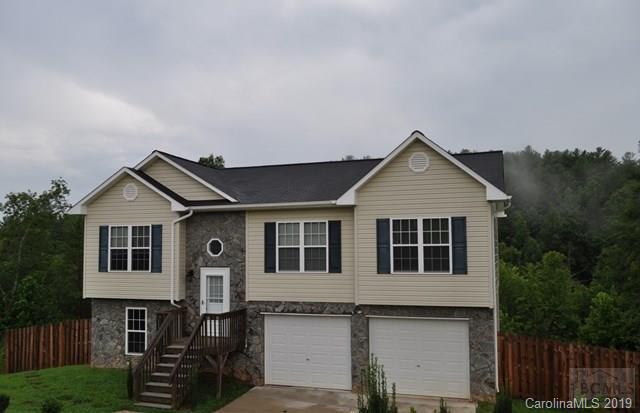 Whether you are looking for your first home purchase or a home with more space, this home is worth seeing. This 3 Bedroom 2 Bath home is nestled in a very nice neighborhood in the Morganton area on 1.25 acres. A spacious home with an open floor plan that shows hardwood flooring accenting the Living Room, Kitchen, and hallway leading to the Bedrooms. Master Bedroom is carpeted and has a Master Bath with a shower tub combo. A large Kitchen with countertop and cabinet space will lead you to the back deck and privacy of the back yard. The unfinished Basement makes a great storage area for your extra storage needs. Enjoy grilling and entertaining on the back deck, the beautiful weather, or rest in the privacy of the partial fenced in back yard.