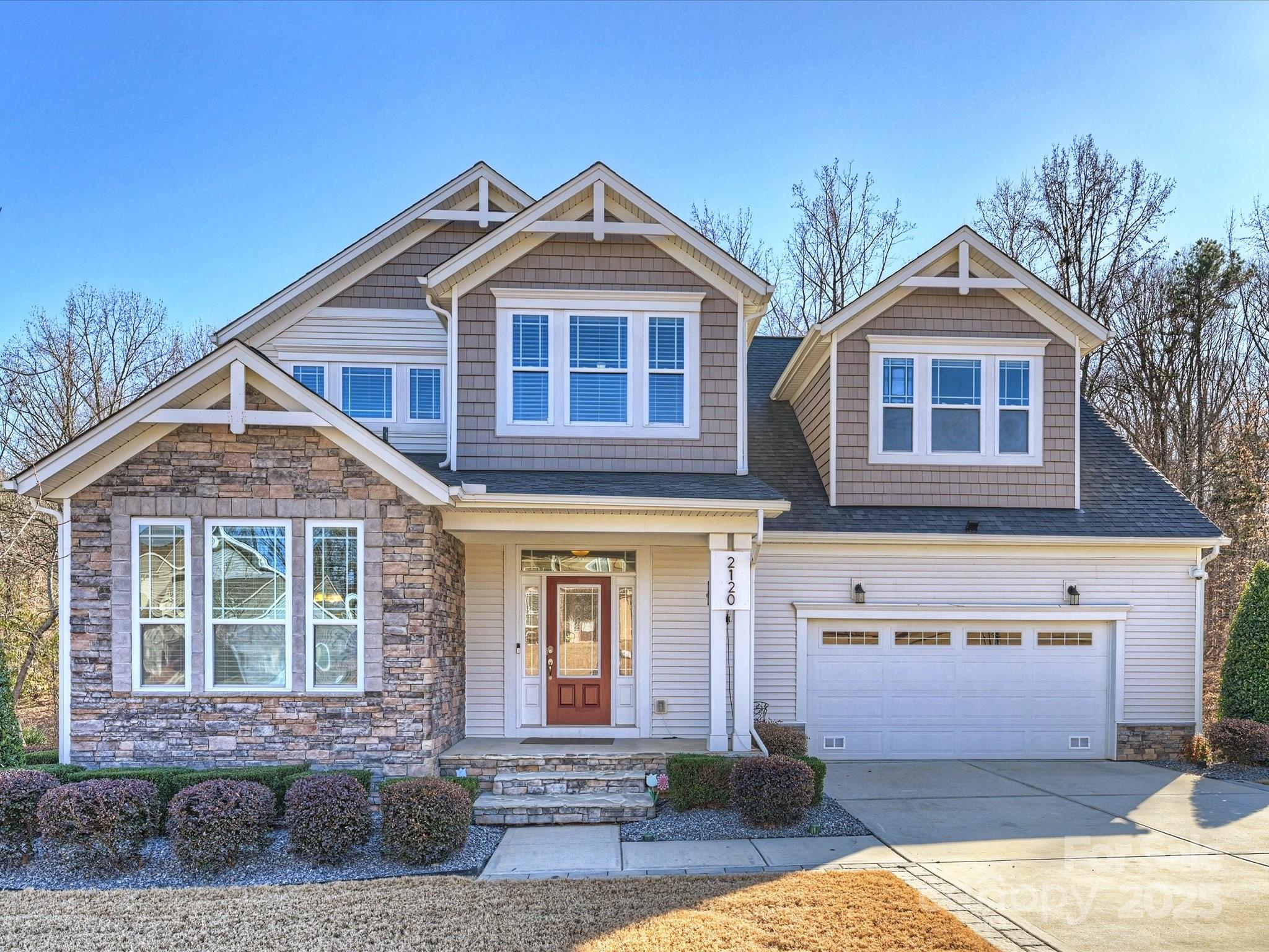 Smart home technology conveniences combined with upgrades galore in a scenic setting complete this desirable home in popular Shelly Woods! The open floor plan and chef's kitchen are an entertainer's delight featuring top of the line appliances: Samsung gas cooktop w/auto vent/hood,42"JennAir counter depth fridge, center island, roll out and soft close drawers w/custom silverware compartments. Granite dry bar has wine fridge and beverage fridge,TV with soundbar, subwoofer, and undercabinet lighting. Owner also added coffee bar w/maple butcher block countertop. Upgrades continue in primary suite on main level w/voice activated lighting, window shades,ceiling fan. Custom closet system. Renovated bath boasts Carrara marble basketweave tile,double vanity w/granite, Grohe & Moen fixtures, programmable huge shower. Entertainment continues outdoors on 3-tiered Trex deck overlooking woods w/steel and metal support system, gas line to Firemagic built in grill and side burner, gas line for fire pit in seating area, outdoor dining area w/lighting and fans. Upper level w/8 foot doors and high ceilings provides 3 bedrooms; full bath; bonus room w/theater seating, surround sound,75"TV. Samsung washer & dryer with pedestals convey. Unfinished basement has additional potential 1700 sq.ft. Owner also added drainage system outside, 8 zone irrigation, programmable outdoor lighting with color feature, driveway lighting. No detail was missed! Close proximity to 521 with many shopping and restaurant options! Don't miss this beautiful home and fantastic value!