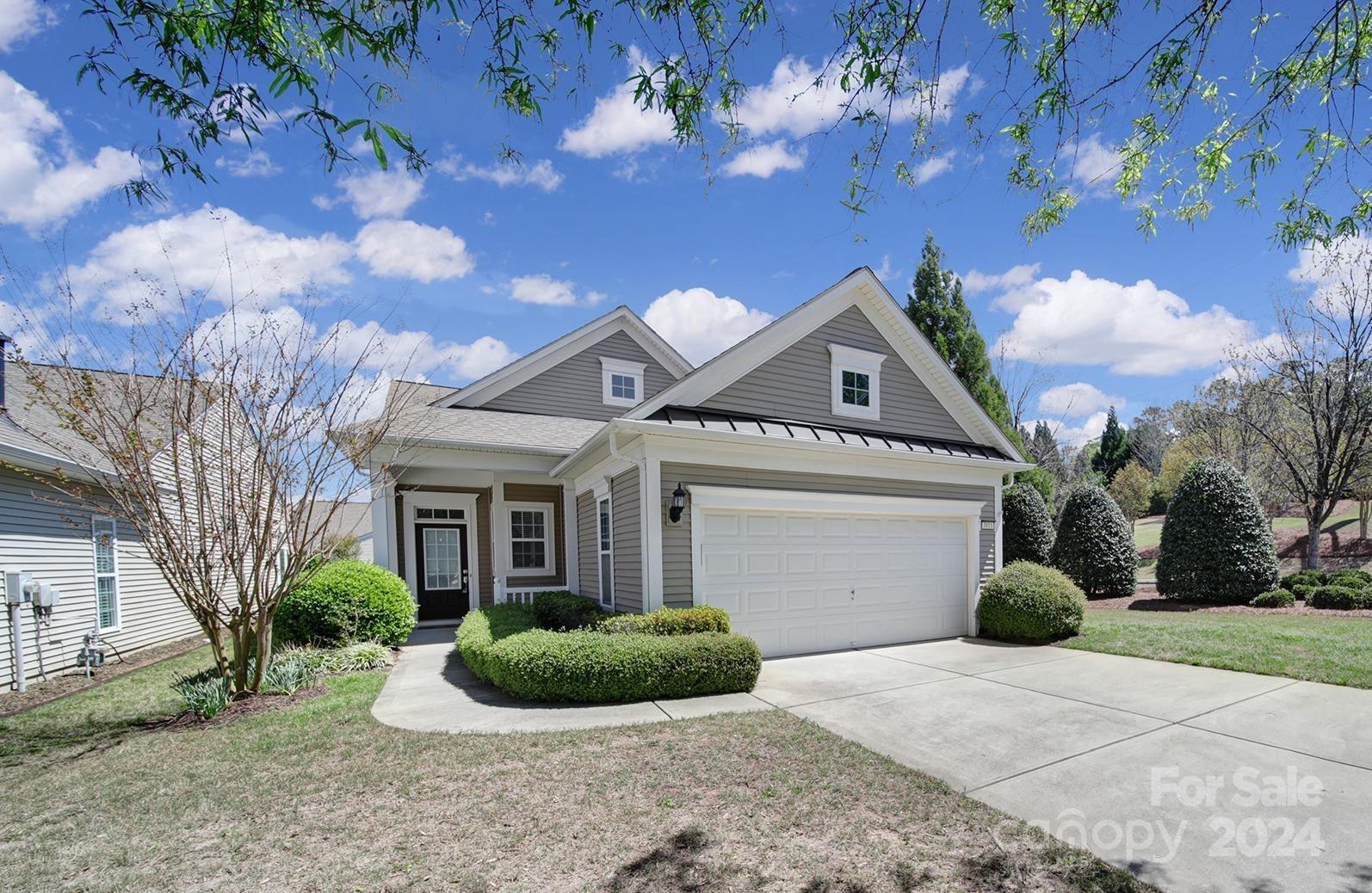 Come see this Fox Run home on a lovely corner lot nestled at the back of the amenity-filled community of Sun City Carolina Lakes! Well-maintained with fresh paint throughout & new carpet in the bedrooms, it is move-in ready! The kitchen has LVP floors, granite counters, an island, pantry, & a sunny breakfast nook. The dining area outside of the kitchen is great for formal meals, and it flows into the open great room & sunroom! 2 sliding doors in the sunroom bring you to the oversized rear patio w/ a privacy fence on one side and privacy landscaping on the other. It's the perfect place for getting fresh air, entertaining guests, or grilling out! At the rear of the home is the primary bedroom with a ceiling fan and a bathroom with dual sinks, a glass enclosed shower, & a large walk-in closet. The guest bedroom & hallway bath are great for visiting friends & family. Don’t miss being a part of this resort-style 55+ community- come enjoy the endless amenities & clubs!