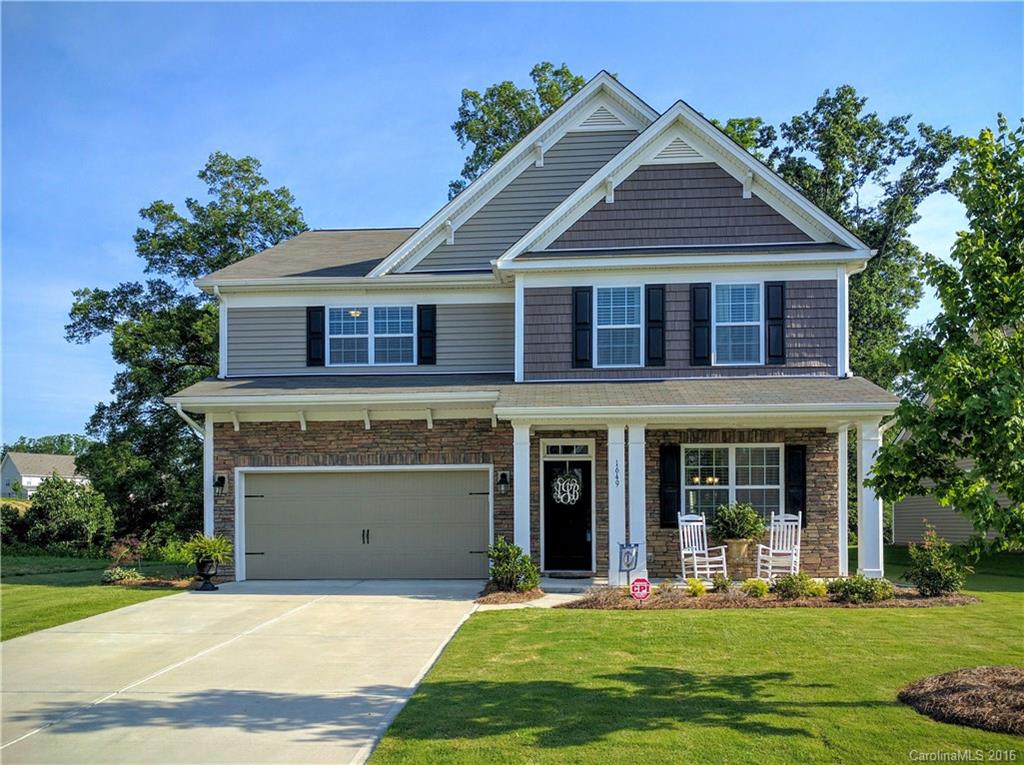 Gorgeous 4 bedroom, 4 bath home, shows like a model, guest bedroom and full bath on main. If you like cooking, then this is the kitchen for you. Elec. cook-top, dbl ovens and much more. Large dining room for big families, hardwoods throughout main level. Stunning master suite w/ sitting area and large bathroom. Landscaping is spot on! Back patio w/ fireplace and stone pavers. This home will not disappoint.