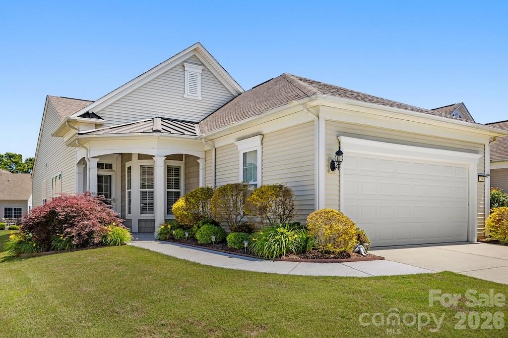 BACK ON THE MARKET AT NO FAULT OF THE SELLER! Beautiful Pine Spring model in the highly sought-after 55+ community of Sun City Carolina Lakes, offering comfort, style, and low-maintenance active-adult living.

This well-maintained 3-bedroom, 2-bath home features an open-concept layout with wood flooring throughout the great room and dining area. Crown molding and classic wainscoting add warmth and elegance to the dining space.

The upgraded kitchen is designed for both everyday living and entertaining, featuring upgraded countertops, a single-bowl sink, tile backsplash, and convenient roll-out shelving.

The spacious primary suite includes an en-suite bath with a walk-in tub, dual vanities, and additional roll-out shelving for added accessibility and functionality.

A private office with French doors and a closet offers flexible living space ideal for a guest room, hobby room, or home office.

Additional highlights include plantation shutters throughout, tile flooring in all bathrooms, and durable Polyurea-coated finishes on both the garage floor and front walkway.

Enjoy resort-style amenities, fitness facilities, social clubs, recreational activities, and the vibrant lifestyle that make Sun City Carolina Lakes one of the area’s premier active-adult communities.
