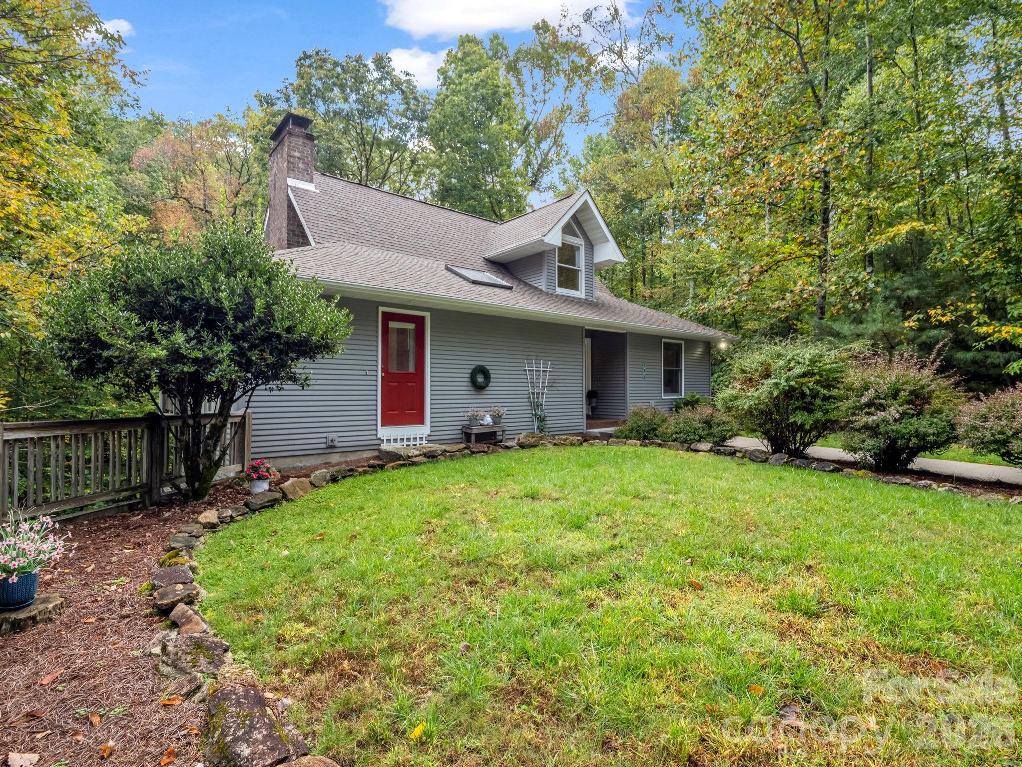 This home now features important recent upgrades including a fully encapsulated crawlspace, new radon mitigation system, improved landscaping for erosion control, and fresh interior drywall repairs and paint. 

This serene, single-level living, mountain home offers a perfect blend of privacy, comfort, and timeless charm.  Set on three wooded acres, it balances privacy with convenience to Hendersonville’s dining, shops, and culture. This home is ideal for as a primary residence, investment property, or mountain getaway. 

The cozy main living spaces has a wood burning fireplace and opens to a large deck. The kitchen and dining areas flow easily for gathering, while the primary suite opens to a private deck overlooking the forest, an ideal spot to enjoy morning coffee or evening sunsets.

Downstairs, the partially finished basement expands your living space with a wood-burning stove, a lower level deck and walk-out access to the outdoors. Whether you envision a recreation room, studio, or guest space, this area offers flexibility to suit your lifestyle.

This is more than a home, it’s a place to slow down and experience the quiet beauty of the mountains. Schedule your private tour today.