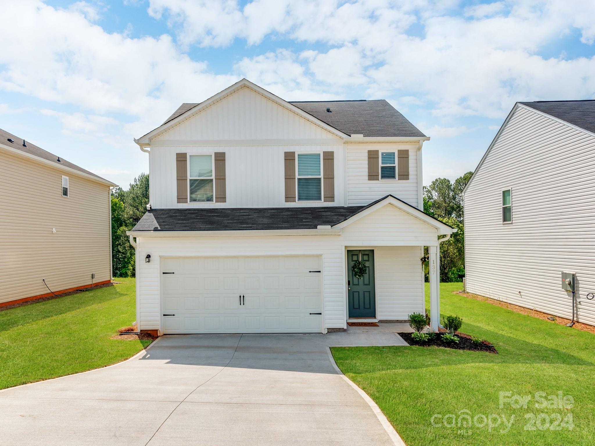 Nestled just minutes away from the bustling outlet mall in South Carolina, this charming 3-bedroom, 2.5-bathroom home boasts convenience and comfort. A spacious two-car garage welcomes you, leading into an inviting open floor plan featuring a convenient half bath downstairs, ideal for guests. The expansive kitchen seamlessly flows into the cozy family room, perfect for gatherings and relaxation. Upstairs, three bedrooms await, accompanied by two full baths, offering ample privacy and space for the whole family. Situated on a generous lot, the backyard oasis beckons with its serene backdrop of woods and a picturesque pond, providing a tranquil retreat right at home.