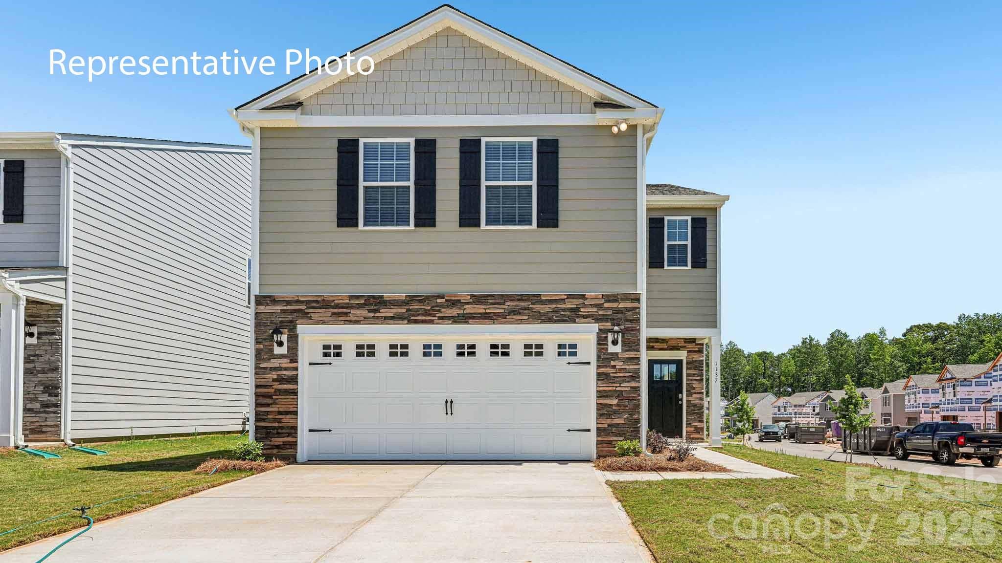 Stanton is an exciting NEW community in Richburg, SC offering a blend of county living and urban convenience. With Luxury amenities, residents can enjoy a high standard of living while having a variety of floor plans to choose from, including single story options. Stanton’s proximity to 1-77 makes commuting to Rock Hill and Charlotte a breeze, allowing for easy access to city excitement while still enjoying the tranquility of suburban lifestyle. 

The Elston is a spacious and modern two story home plans featured at Stanton in Richburg, SC. The home features four bedrooms, two and a half bathrooms, and two-car garage. The open concept layer connects the home beautifully, where the inviting foyer will lead you into the heart of the home, where the kitchen and large family room meet to create a welcoming atmosphere. The kitchen’s stainless steel appliances, ample cabinet space, and a center island make it perfect for cooking and entertaining. The home features a primary suite with a walk-in closet and an en-suite bathroom with dual vanities. The additional three bedrooms provide privacy and comfort and share access to a secondary bathroom. A loft space on the second floor can be used as a media room, home office, or playroom. Additional features include a laundry room, ample storage closets, and large windows for natural light. With its thoughtful design, spacious layout, and modern conveniences, the Elston is the perfect place to call home at Stanton in Richburg, SC.