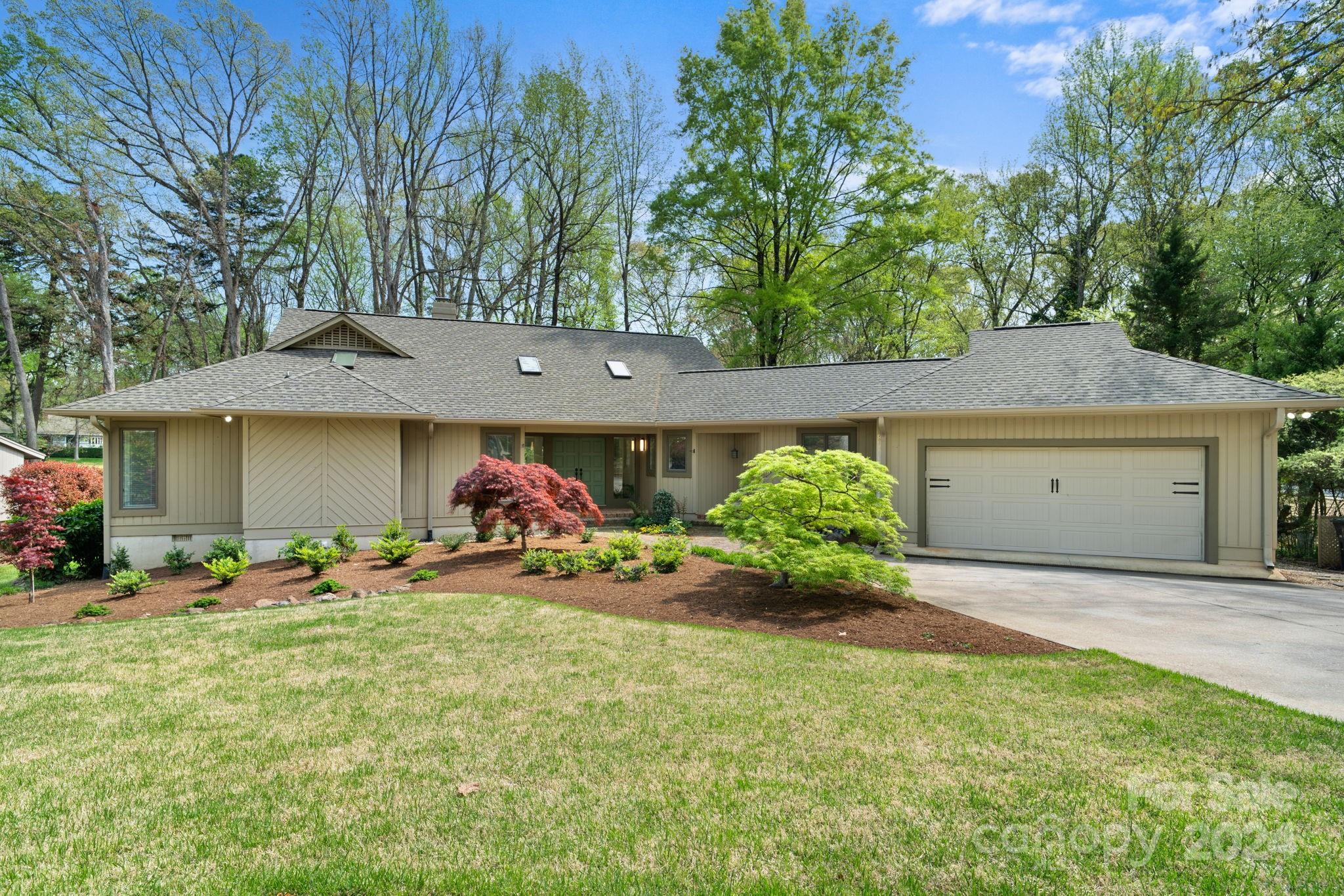 Welcome to this stunning mid-century modern ranch, showcasing beautifully refinished oak flooring in the resort-style River Hills neighborhood. Meticulously maintained, this home boasts an abundance of natural light, offering scenic views of the adjacent golf course & professionally landscaped grounds. The private deck outside the owner's suite provides a serene retreat. The large, open living room features new windows, vaulted ceiling & a gas log fireplace. A separate office offers a dedicated workspace, ideal for remote work or study. The Jack & Jill bathroom, situated between the 2 guest bedrooms, provides convenience & privacy for guests or family. Completing this home is a 2-car garage, newer roof, newer HVAC, updated crawlspace, & new paint throughout. Experience miles of walking trails, marina, country club boasting an 18-hole golf course & 2 pools, playgrounds & waterfront park with a sandy beach! Embrace a lifestyle of luxury, complemented by a 24-hour guard gate.