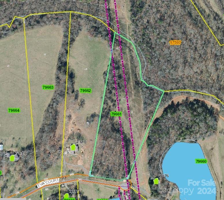 This 10-acre parcel of land offers a rare opportunity for buyers seeking space and serenity. Outside city limits, but close to schools, shopping and highways. The land is mostly wooded.  This is an established neighborhood on a State Road at the end of a cul de sac.  Although this property has a 68' Duke Energy easement that runs partially through it on one side, there is still plenty of room to build your dream home.  Rutherford Electric also has an easement on the property. See plat for further details. According to GIS, at the very back edge of the property, .215  is in flood plain.