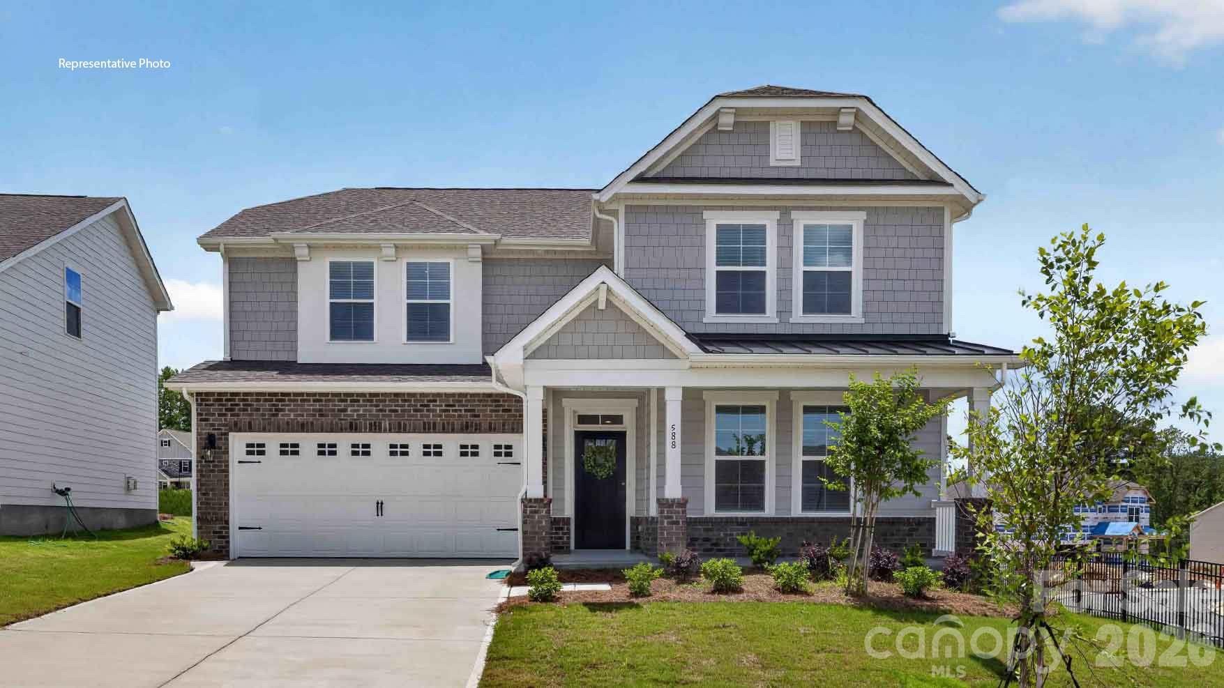 Come see 524 Mahogany Road in York, South Carolina.

The Cooper is one of our new two-story plans at Westport in York, SC. It is a spacious and modern two-story home designed with open concept living in mind. This home features four bedrooms, three bathrooms and a two-car garage.
Upon entering the home, you'll be greeted by an inviting foyer that welcomes you to a bed and bath on the first floor and leads directly into heart of the home. This impressive space features a family room, dining area, and well-appointed kitchen. The kitchen is equipped with a pantry, stainless steel appliances, and a large island with a breakfast bar, making it perfect for both cooking and entertaining.
Upstairs this home also features a primary suite, complete with two large walk-in closets and en suite bathroom featuring dual vanities and soaking tub and shower. The additional two bedrooms share a full bath that includes dual vanities.

With its thoughtful design, spacious layout, and modern conveniences, the Cooper is the perfect place to call home at Westport in York, SC.

Pictures are representative.
All this and a large pool, clubhouse to come and only a few minutes to Lake Wylie boat ramp and park.

Special Financing rates available with preferred lending!