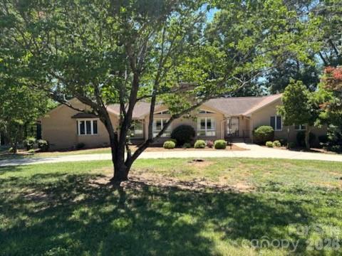 *Ideal "Multi-Generational" - "Family Compound"  TWO-Family Possibilities Property!! 
Custom Built Circa Year 1978 Brick Veneer Very well maintained 5 Bedroom / 3.5 Bathroom Basement home w/ 1.632 Acres of serene PRIVACY (*ADDITIONAL #3 ACRES ADJOINS May be purchased for additional money if wanted). Located on state maintained paved NO EXIT Cul-De-Sac Taylor Road "In the country but within 2 Miles of Cleveland Mall, Restaurants, Gas, etc." ( 11.88 Acres of retained Family land in serene pastures and wooded land leading to flowing Creek at rear). Includes: Entrance Foyer w/ gleaming Hardwood Floors leading to LARGE Vaulted Ceiling Family Room and custom Stairs leading to finished Basement. * TWO Kitchens, 2 Brick Fireplaces, Heated Glassed Sunroom w/ Extra Large Wood Deck off of Sunroom, Utility Room w/ Sink, Large Double Garage w/ electric Door and opener. Walk out Basement w/ Drive around access, Bedroom, Full Bathroom, Storage / HVAC Room, W/additional 1/2 Bathroom. *Would make a nice TWO FAMILY home W/ ADDITIONAL ACREAGE AVAILABLE!! *Newer HVAC and Water Heater in very good condition W/ Much ample Storage ; Partial New Shingles % Hurricane Helene, ALL Window Treatments remain. * #2,648 Total Heated and Cooled UPStairs Square Feet Finished Area W/#1970 Sq. Ft. Finished Heated and Cooled area in basement with #653 Sq. Ft. Unfinished but heated and cooled storage area in basement, W/HVAC and Newer Hot Water Heater in Basement. *PLEASE SEE PHOTOS AND ATTACHED DOCUMENTS! *Many Custom extras including 2 Walk-In custom Tiled Showers, LARGE ROOMS, Vaulted Great Room Ceiling, Large Deck looking out at serene pasturelands and more! 
*Home's septic system was permitted for #4 Bedrooms in 1979, but it actually has #5 Bedrooms....Septic tank was recently pumped with no issues...