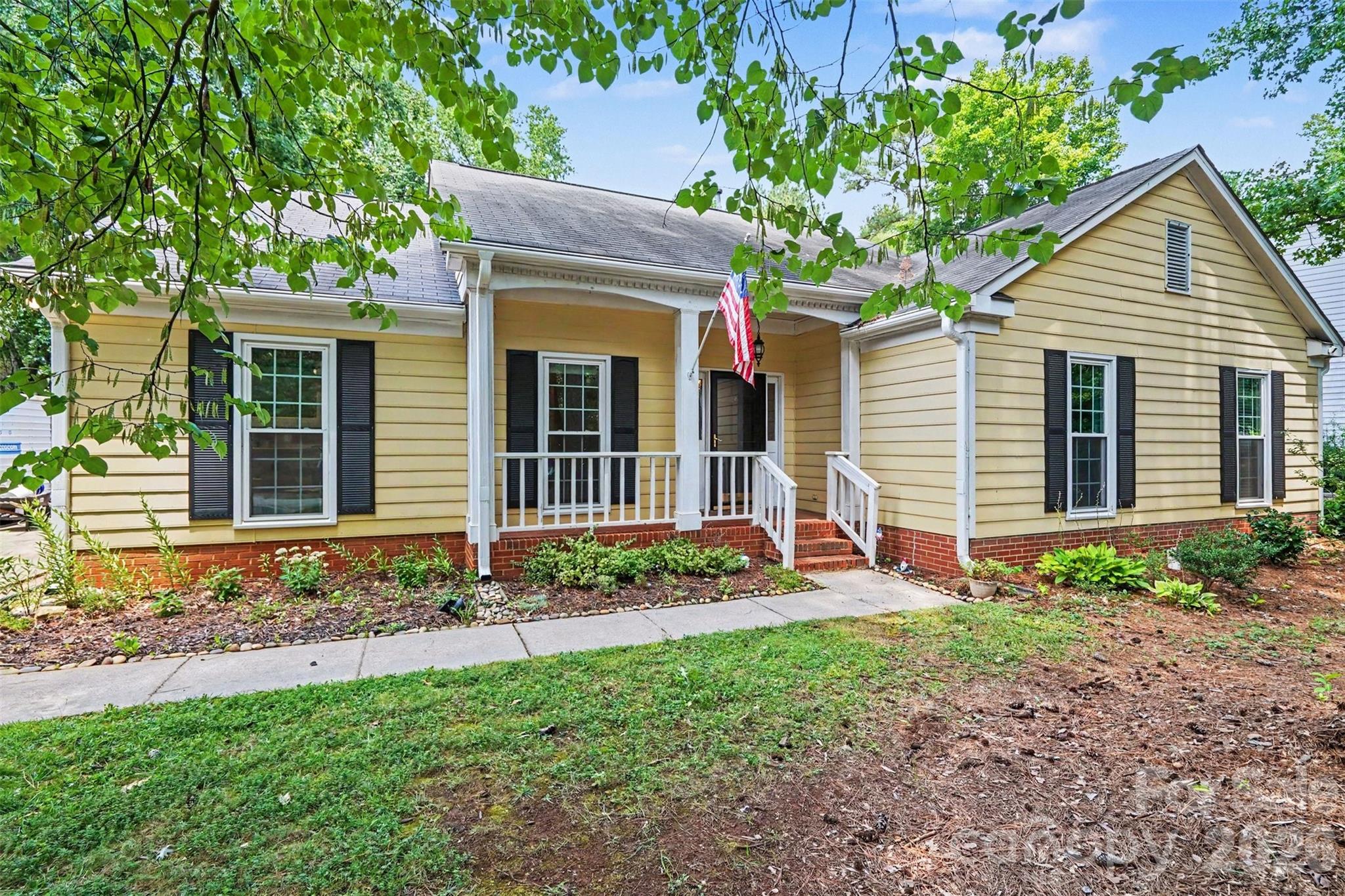 Well-maintained 4-bedroom ranch in desirable Wellington! Spacious Great Room with cozy gas fireplace and vaulted ceilings. Enjoy relaxing on the screened rear porch overlooking the fenced backyard with mature trees. Both full baths feature tile floors and tile-surround tub/showers. Recent updates include new HVAC (2022), water heater (2023), 13K Leaf Guard gutter system (2023), professionally cleaned ductwork (2026) and UV light added to HVAC system for improved air quality. Community amenities include pool, tennis courts, playground, recreation areas and Greenway access nearby. Convenient location near I-85 and I-485, and approximately 10 minutes to Northlake Mall, UNCC, and Latta Nature Preserve. Schedule a showing today!