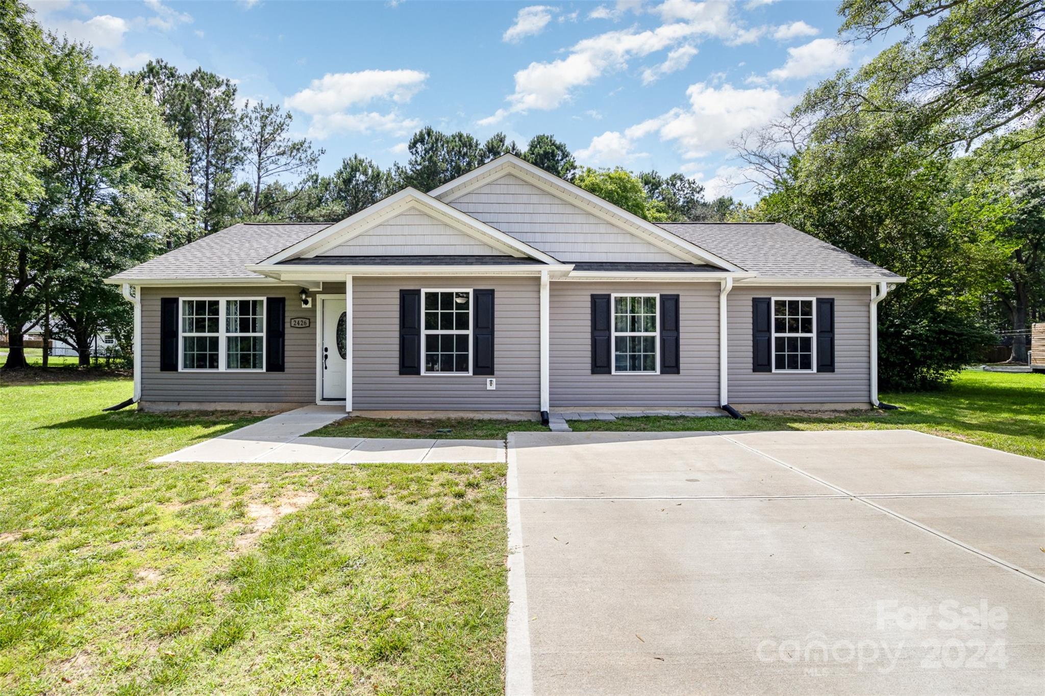 Meticulously kept home ready for new owners! Granite counter tops in kitchen and baths, LVP floors, and stainless steel appliances! 1/2 an acre of land that is level and cleared. You won't beat the price!
