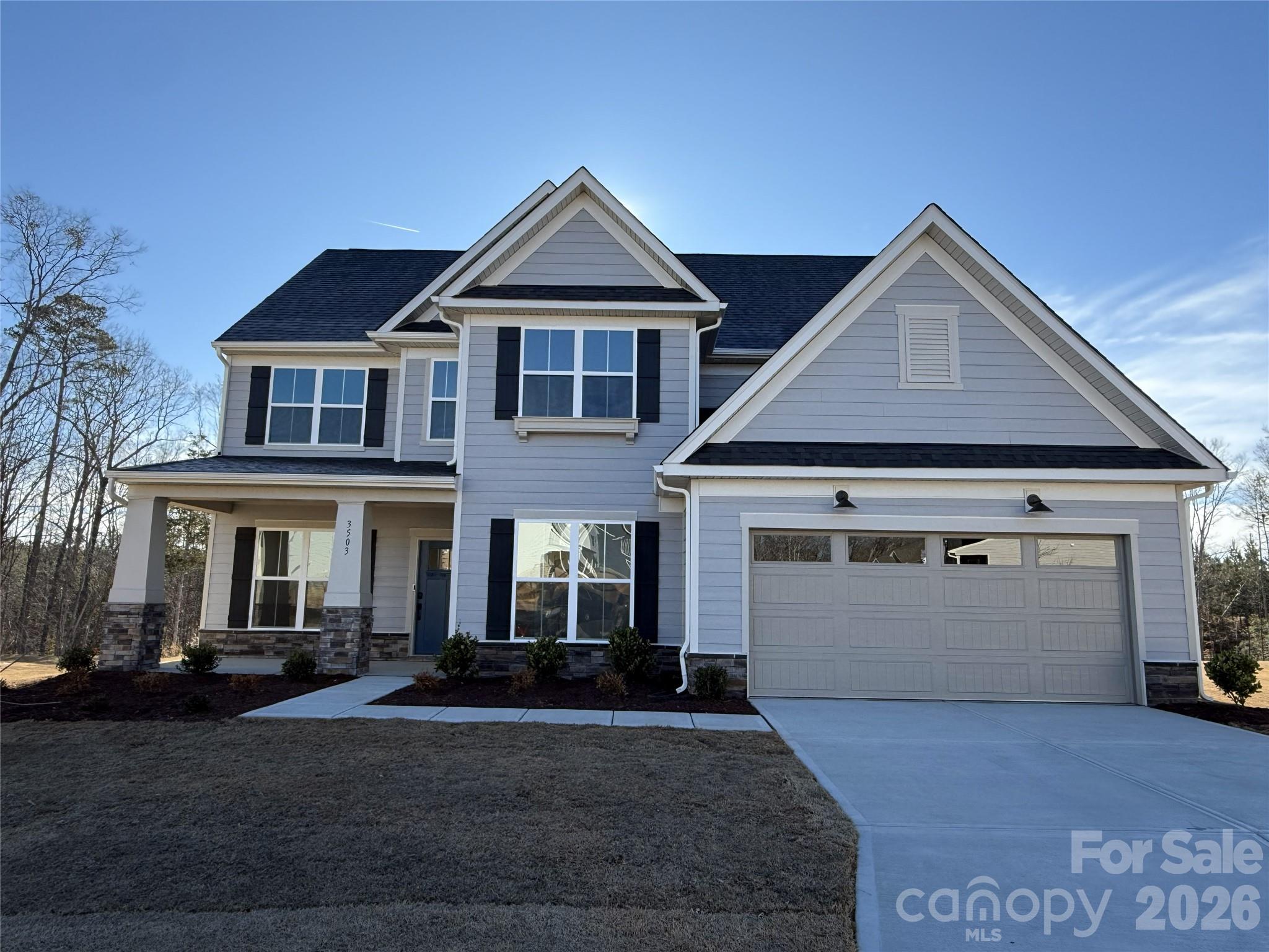 The breathtaking Vanderbilt home is ready now!  Located in our the new Kinsdale Community in Indian Land!  All included List Price includes any current sales incentives as shown on our website, call for details.  This stunning Vanderbilt home is located on a cul-de-sac lot and offers beautifully curated selections and incredible structural features such as a covered porch, offering the convenience with Owners Bedroom, Bath and Laundry on the main floor as well as a library and planning center for working at home. This open floor plan will not disappoint with the spacious Gathering Room, gas fireplace and magnificent Gourmet Kitchen with gas appliances.  Upstairs features 3 additional bedrooms and 2 full Baths.  All upgrades and options have been selected.  Visit us at our sales center, in the community, to learn more about this and other incredible homes in tranquil Kinsdale. HOA fees include High-Speed Internet/Cable and private trash collection.
