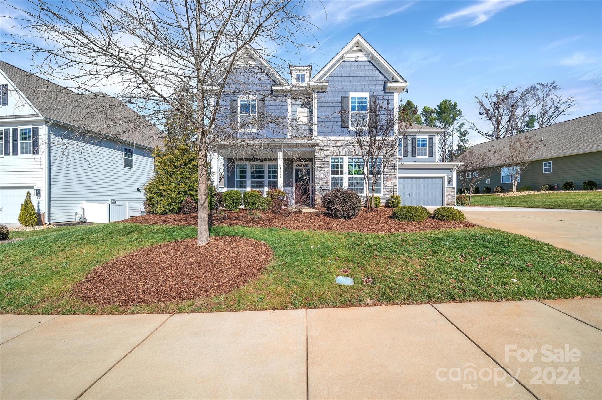Step into Southern elegance with this stunning 3700+sqft. 5BDRM/4.5 BTH, nestled in Lake Wylie. close to community amenities,( sparkling pool/ live pickle-ball court),former model home offers a taste of resort living. The  charming stone facade/ garden bursting with year-round blooms ,welcome you into a world where modern convenience meets traditional grace. SMART HOME system/ a gourmet kitchen decked out with stainless steel appliances, custom soft-close cabinetry, and pristine white quartz countertops.The main level has pre-finished hardwoods through-out/guest bedroom and 1.5 bths. Upstairs features a luxurious primary suite with spa-like bath and 3 other bdrms/2 full Bths, laundry and huge bonus room.MUST SEE  tranquil backyard with a covered patio and integrated grill—the perfect setting for Southern hospitality. Experience a genteel lifestyle, where every detail adds warmth and character. Partially fenced, Home is ADA compliant. No city taxes, annual taxes 3,782.00 ,irrigation.