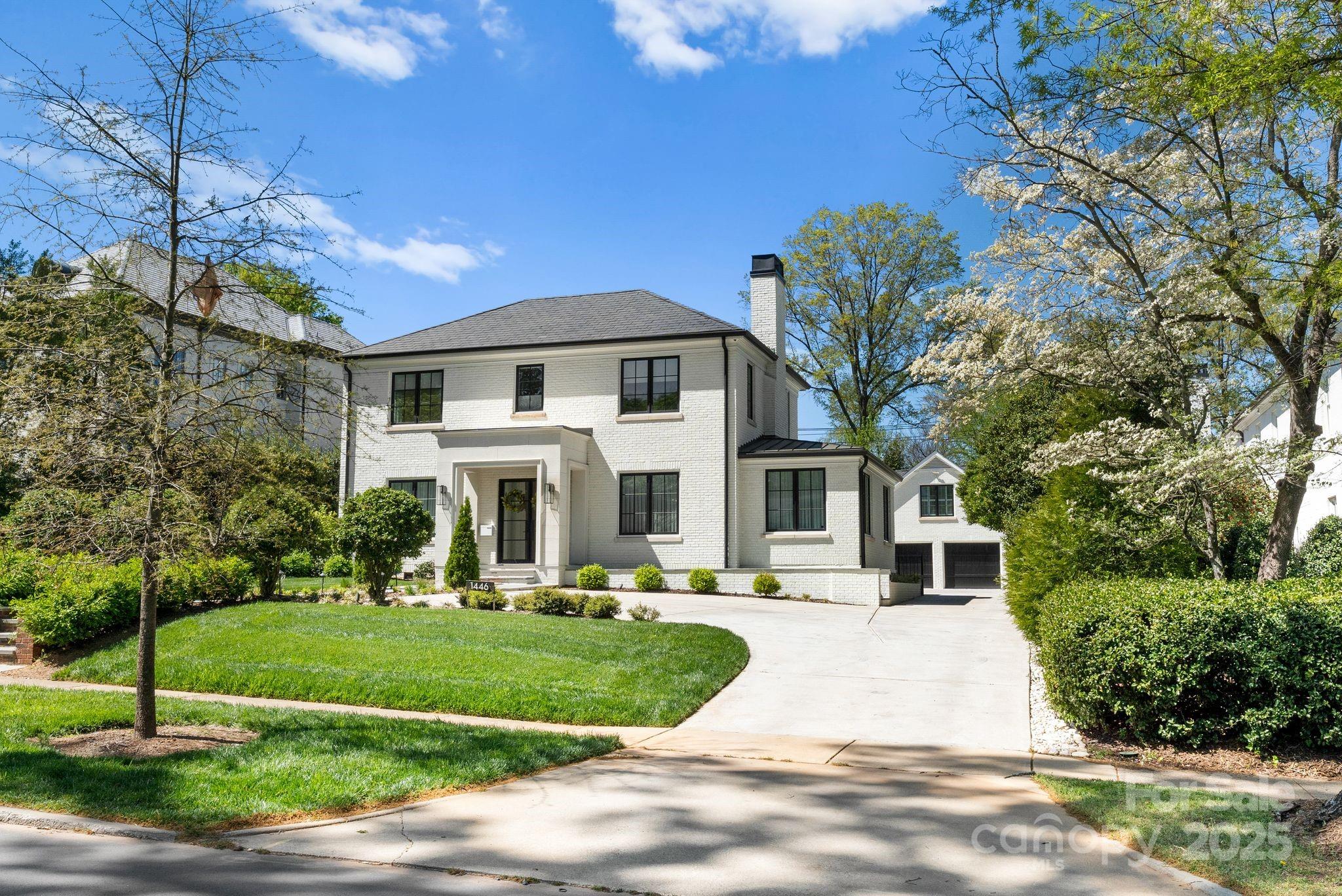 Welcome to 1446 Queens Road West. This home is better than new construction! Meticulously renovated w/ white oak hardwood floors & 12" solid wood baseboards, 4 gas fireplaces w/ fireballs & controllers. It features a 98 bottle glass enclosed wine wall, Sub-Zero & Wolf appliances, custom cabinetry throughout. Lutron LED recessed lighting, oversized double pane commercial grade casement windows, custom built-in closets. The main level has a private office w/ additional soundproofing and a kitchen open to the family room. The upper level has 5 BR including the spacious primary BR & bath w/ floor to ceiling Italian tile. The basement can be used as a media room, gym or bonus room. The 500 sq foot covered patio has a gas FP, built in heaters, stained wood ceiling, and white slate tile. Enclosed private backyard. 5000 sq ft new driveway, 3 car climate controlled garage & guest house w/ full bath. Bluestone front porch and walkway. Security gate, CAT6 hardwired security system inside and out.