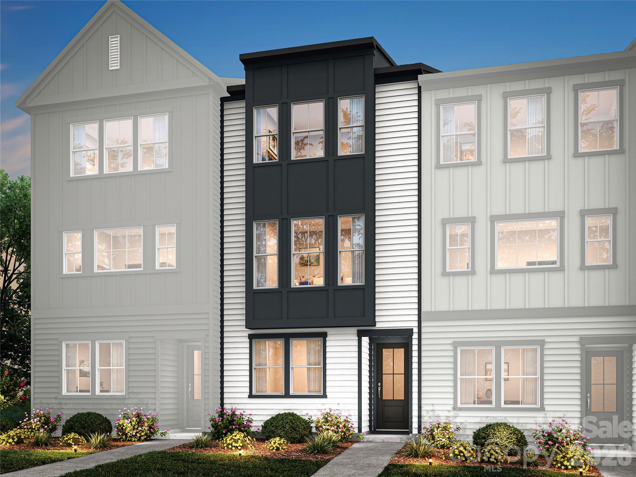 Nestled in the heart of South Charlotte, Bellflower puts you minutes from SouthPark's renowned shopping and dining, the everyday conveniences of the Arboretum, and highly rated schools. The Dahlia plan at 5416 Whaler Walk Way offers three bedrooms, three-and-a-half bathrooms, and 2,004 square feet of thoughtfully designed living spread across three floors. The first floor will feature a private bedroom and full bathroom with a tiled walk-in shower, ideal for guests or flexible living needs. Oak box stairs will lead you up to the second floor, where the heart of the home awaits. An open-concept layout will anchor a gourmet kitchen with direct vent, and from there you will have direct access to a covered outdoor living space perfect for entertaining or unwinding. The third floor will be home to the primary suite, complete with a tiled walk-in shower and access to a spacious walk-in closet, alongside a secondary bedroom with its own en suite bathroom featuring tiled walls above the tub. A dedicated laundry room with storage will round out the third floor. Designability is at the heart of the experience, giving you the opportunity to personalize finishes alongside an expert design team while tracking your home's progress through a one-of-a-kind app. Anticipated move-in date of January 2027. Photos are conceptual
