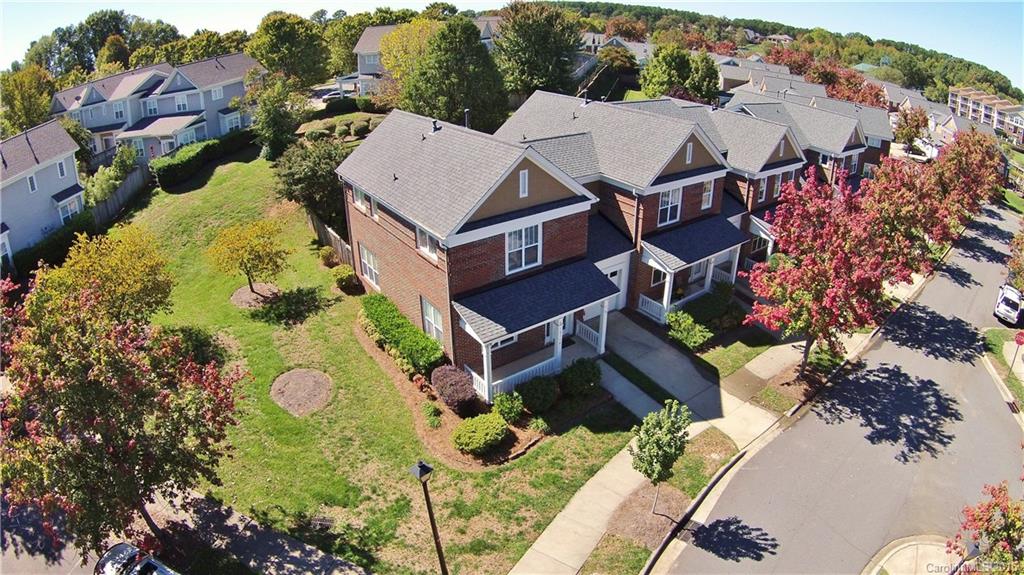 Full Brick 3 Bedroom, 2.5 Bath home in Harborside Waterfront Community. Open Floor Plan with lots of light flowing through! Recent $10,000 remodel with many Upgrades! Kitchen has new Granite Countertops, Stainless Steel Appliances- New Hardwood Flooring and Carpet on Main! Gas Fireplace in Great Room. Spacious Master Bedroom and Bath! Fenced backyard with Brick Patio. Private End Unit offers extra windows on side of home! Walk to Lake, Pool and Port City Restaurant! $500 Home Warranty Included!