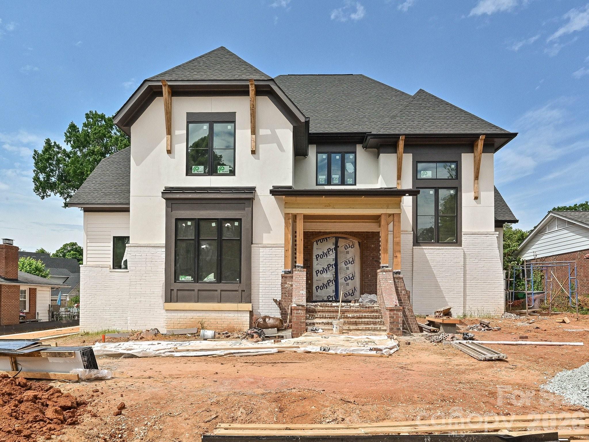 Nestled in the highly sought-after Ashbrook neighborhood, this exceptional new construction home offers the perfect blend of luxury, comfort, and location. Featuring 4 bedrooms, 4 full bathrooms and two half baths , this new build by RAM construction showcases elevated design and high-end finishes throughout.

The thoughtfully designed floor plan includes spacious living areas, designer lighting, wide-plank hardwoods, and a stunning chef’s kitchen with premium appliances, custom cabinetry, and an oversized island ideal for entertaining. The luxurious primary suite offers a spa-inspired bath and expansive walk-in closet.

Step outside to your private backyard retreat complete with a covered porch and outdoor fireplace overlooking the fenced yard, resort-style in-ground pool, and spa — perfect for year-round enjoyment.

A detached garage with a beautifully finished studio above provides endless flexibility for a guest suite, home office, gym, or creative space.

Located just minutes from Park Road Shopping Center, Uptown Charlotte, South End, and SouthPark, this home combines convenience with one of Charlotte’s most desirable neighborhood settings.

A rare opportunity to own a stunning custom home in the heart of Ashbrook.