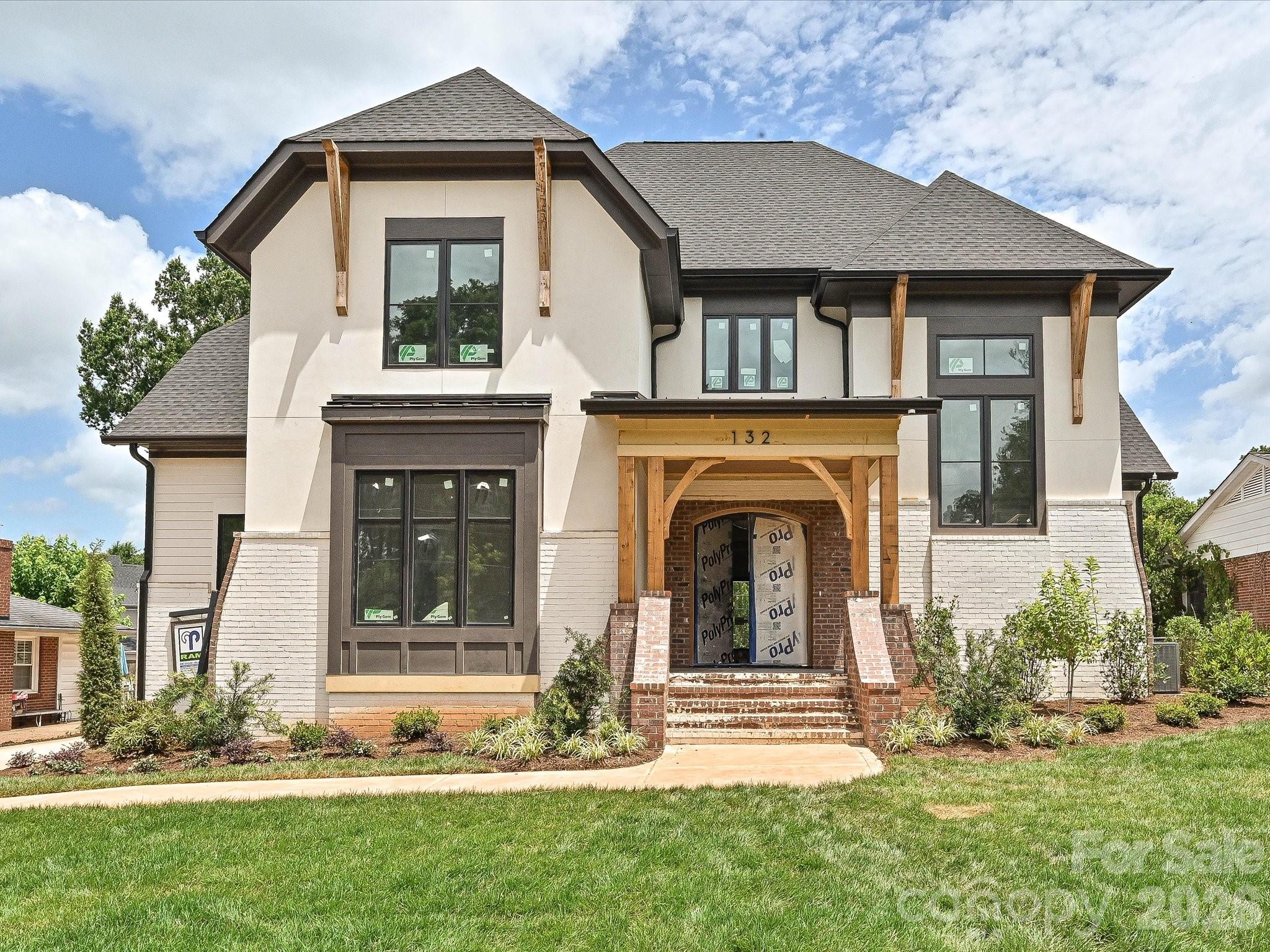 Nestled in the highly sought-after Ashbrook neighborhood, this exceptional new construction home offers the perfect blend of luxury, comfort, and location. Featuring 4 bedrooms, 4 full bathrooms and two half baths , this new build by RAM construction showcases elevated design and high-end finishes throughout.

The thoughtfully designed floor plan includes spacious living areas, designer lighting, wide-plank hardwoods, and a stunning chef’s kitchen with premium appliances, custom cabinetry, and an oversized island ideal for entertaining. The luxurious primary suite offers a spa-inspired bath and expansive walk-in closet.

Step outside to your private backyard retreat complete with a covered porch and outdoor fireplace overlooking the fenced yard, resort-style in-ground pool, and spa — perfect for year-round enjoyment.

A detached garage with a beautifully finished studio above provides endless flexibility for a guest suite, home office, gym, or creative space.

Located just minutes from Park Road Shopping Center, Uptown Charlotte, South End, and SouthPark, this home combines convenience with one of Charlotte’s most desirable neighborhood settings.

A rare opportunity to own a stunning custom home in the heart of Ashbrook.