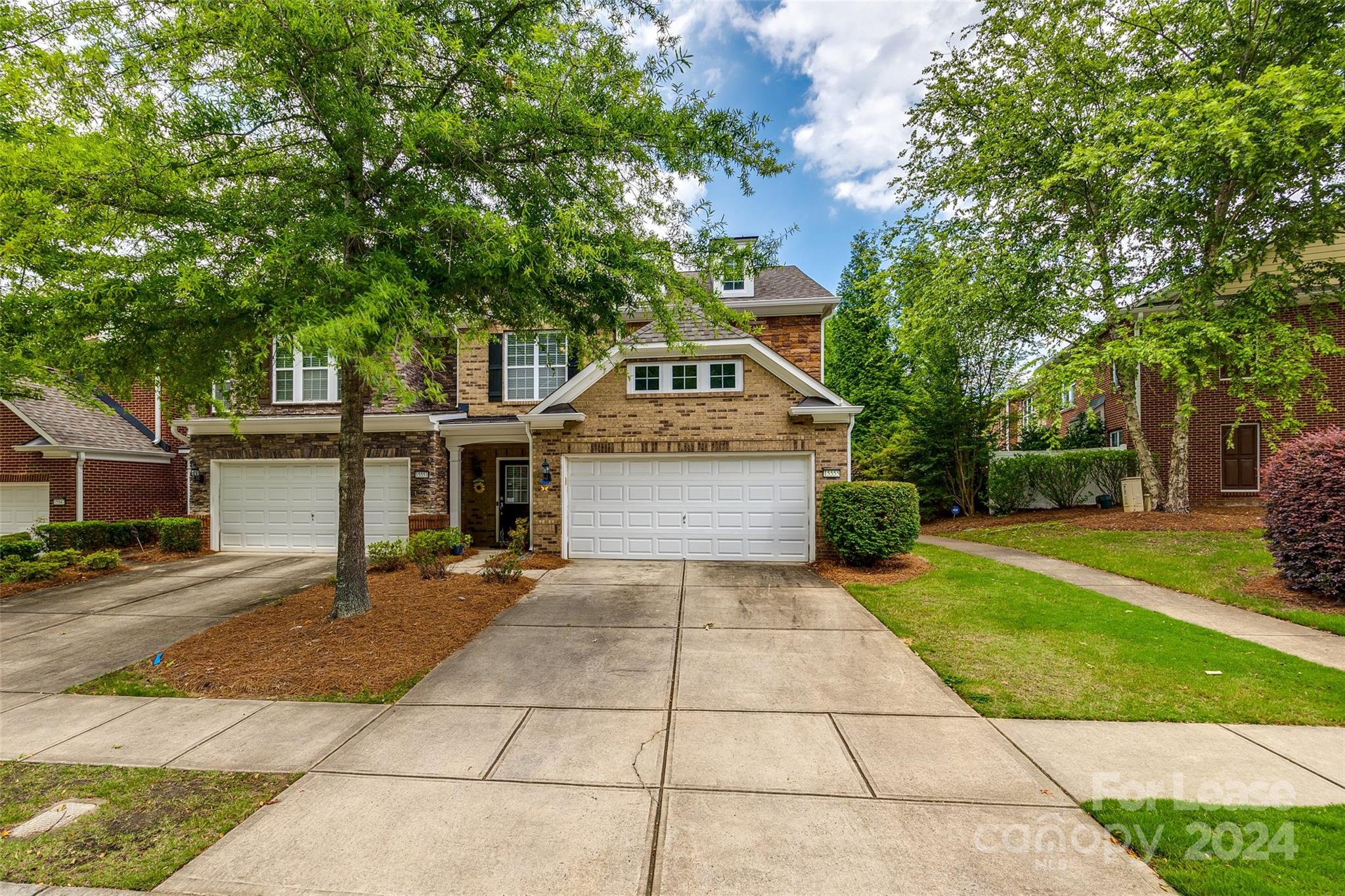 2 story, full brick exterior townhouse w/granite countertops, S.S. appliances, crown molding, HDWD floors throughout downstairs. All BR upstairs, owners ensuite has a large walk-in closet, garden tub, spacious stall shower, dual vanities. Laundry room upstairs has a washer & dryer. 1 car garage. Behind is the neighborhood community pool and close proximity to entertainment, shopping, and restaurants!