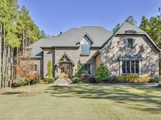 Beautiful custom home on lg wooded lot. 4br, 3/2ba, stone exterior, loaded w/ upgrades. Beautiful crown moldings, trey ceilings, exotic hardwoods. Gourmet kitchen, granite counter tops, Viking s/s appliances, island.  Formal dining, fireplaces, lg bonus, entertainment/media/rec room.  Huge screened in porch on main level, rear patio, beautifully landscaped yard, pool, outdoor kitchen, 3car garage. Minutes from Southern Bypass. A must see!