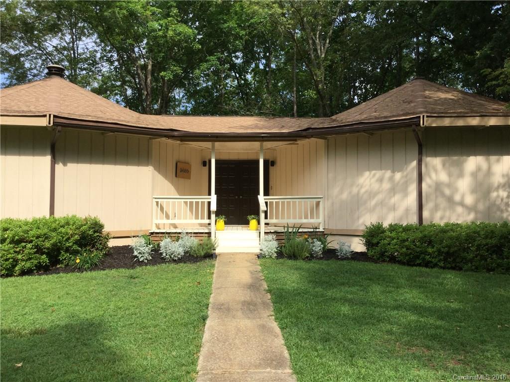 The most FUN ranch home in TC!  If architectural detail like 180 panoramic picture windows, vaulted ceilings, & a 360 round stone hearth fireplace are for you, look no further.  Lake & park views, quiet corner lot.  Think outside the box!  Think double round layout.  One open floor plan & one for beds/baths.  Partially updated incl. new deck, 1 HVAC unit, dishwasher & bath upgrades.  Walk-out basement.  Level drive to park several cars & room to add a garage.  New roof & windows in 2011.