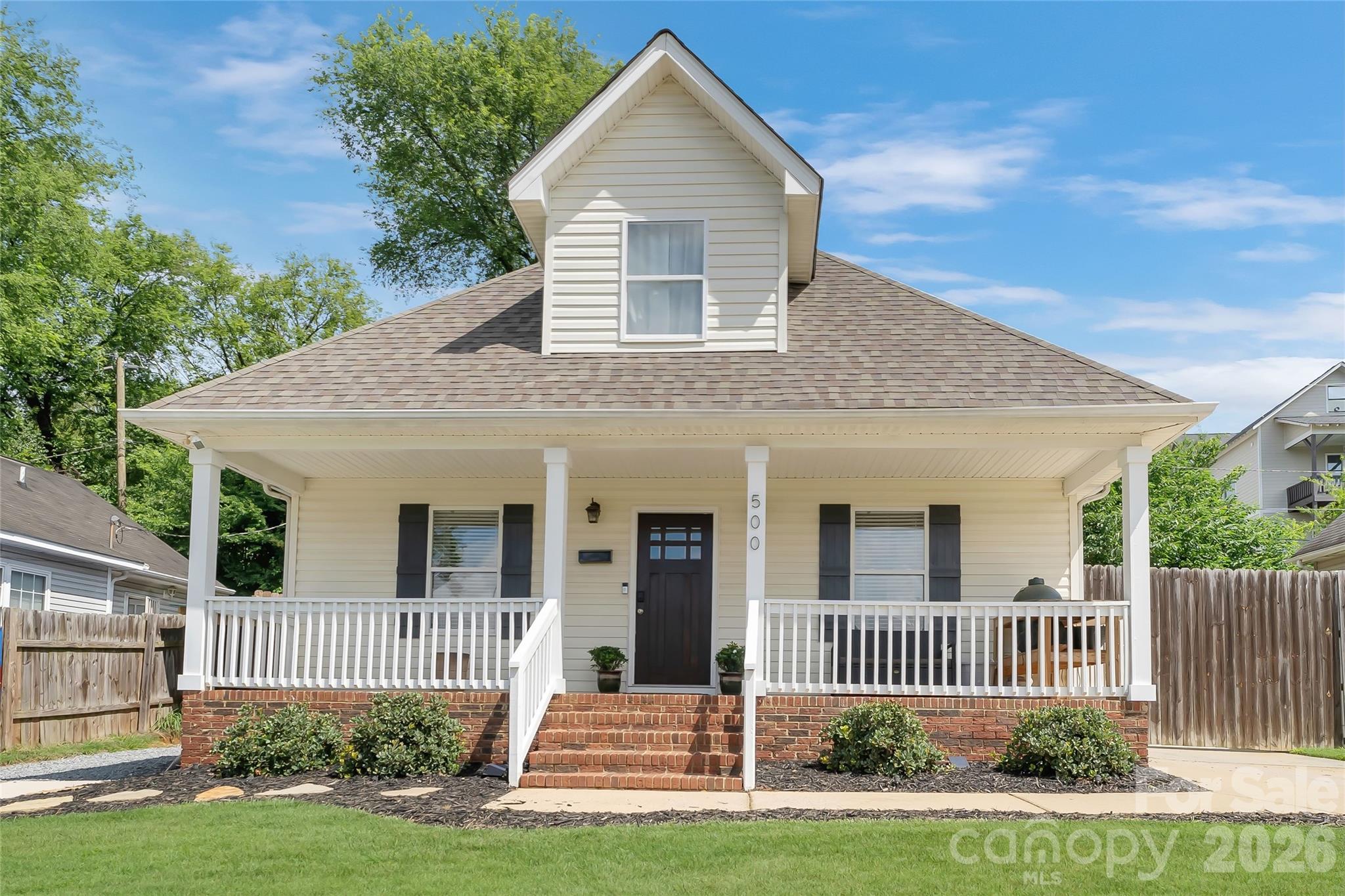 Welcome to 500 Katonah Ave! Located just minutes from Uptown Charlotte, this charming home offers the perfect blend of comfort, convenience, and flexibility. With easy access to the Light Rail and Stewart Creek Greenway, you can walk, bike, or commute effortlessly to Uptown, Savona Mill, and other nearby destinations.
Offering just under 1,600 square feet, this versatile home adapts to your lifestyle. Relax on the inviting full front porch—perfect for morning coffee or evening rocking-chair conversations—or enjoy the privacy of the fenced backyard, complete with a large storage shed and plenty of space for entertaining, gardening, or pets.
Recent updates and modern finishes make this home truly move-in ready. The main level features a spacious primary suite with a walk-in closet and private full bath, along with an additional bedroom that can easily serve as a home office or nursery. You'll also find an oversized laundry room with extra storage and a convenient half bath. The thoughtfully designed floor plan provides an open feel while maintaining distinct living spaces that flow naturally from one room to the next.
Upstairs, you'll find two generously sized bedrooms, a full bathroom, and a large walk-in attic space that offers exceptional storage potential.
Outside, the fully fenced backyard features an 8-foot privacy fence, creating a peaceful retreat with plenty of room to enjoy the outdoors. An additional driveway provides extra parking and storage options, adding to the home's practicality.
Situated on a quiet dead-end street, this property offers both privacy and accessibility in one of Charlotte's rapidly growing areas. Surrounded by ongoing revitalization and new development, this is an exciting opportunity to invest in a neighborhood with tremendous future potential.
Don't miss your chance to make this wonderful home your own—schedule your showing today!