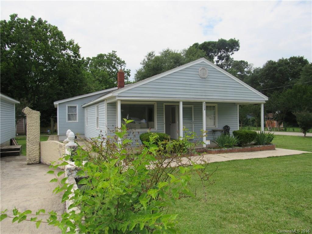 Location location location.  Conveniently located off Cherry Rd is this great family ranch on over a half acre lot.  Home also has over sized 2 car detached garage and crazy amount of parking  available. If you like to have family get togethers this home has extra large masonry wood fired grill, located in its own building. Home needs some work; however, is in very liveable condition.  Current owner has put in n some new laminate flooring and partial fresh paint. home sold AS IN condition