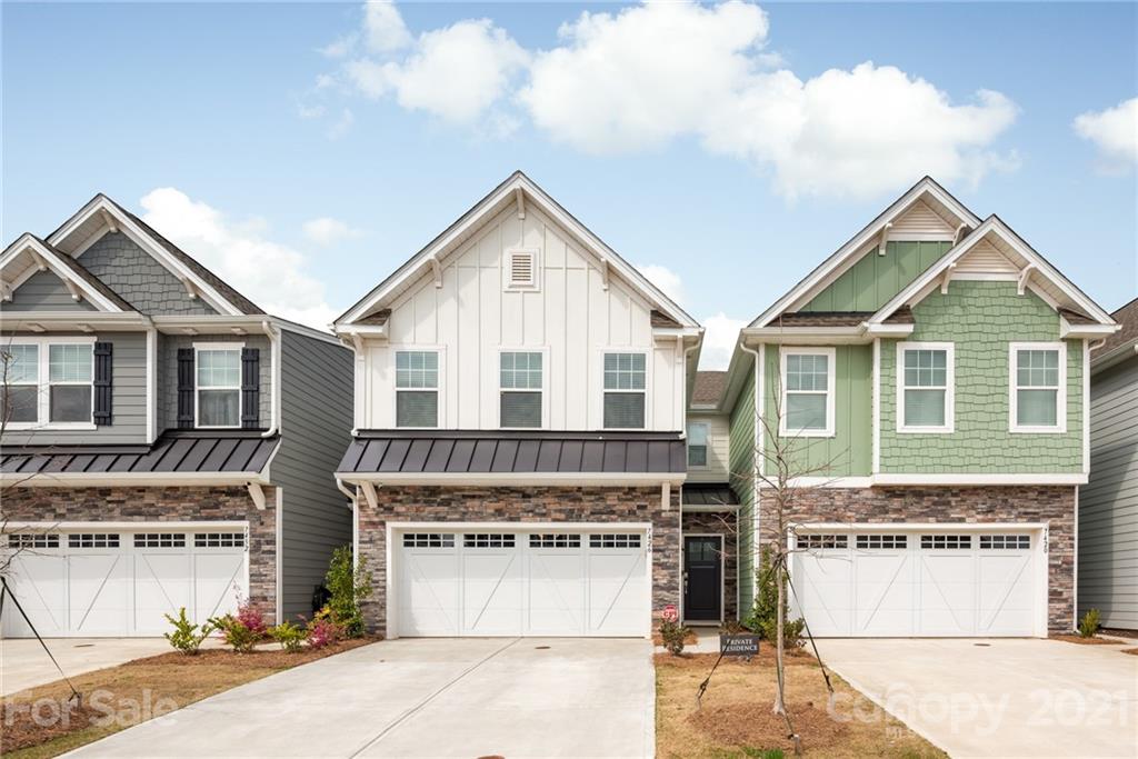 Like-New beautiful townhouse built in 2020! Move-in Ready! No need to wait for one to be built! Centrally located near all major roadways and attractions. Neighborhood amenities include junior Olympic sized pool, splash pad, walking trails, and fitness center! This lovely home boasts beautiful finishes, new flooring and new paint completed last week! Custom fireplace with a floor to ceiling built in bookshelf surrounding the fireplace! Wait until you see this kitchen! This home has been cared well and was built just a year ago in 2020! MOVE IN READY!